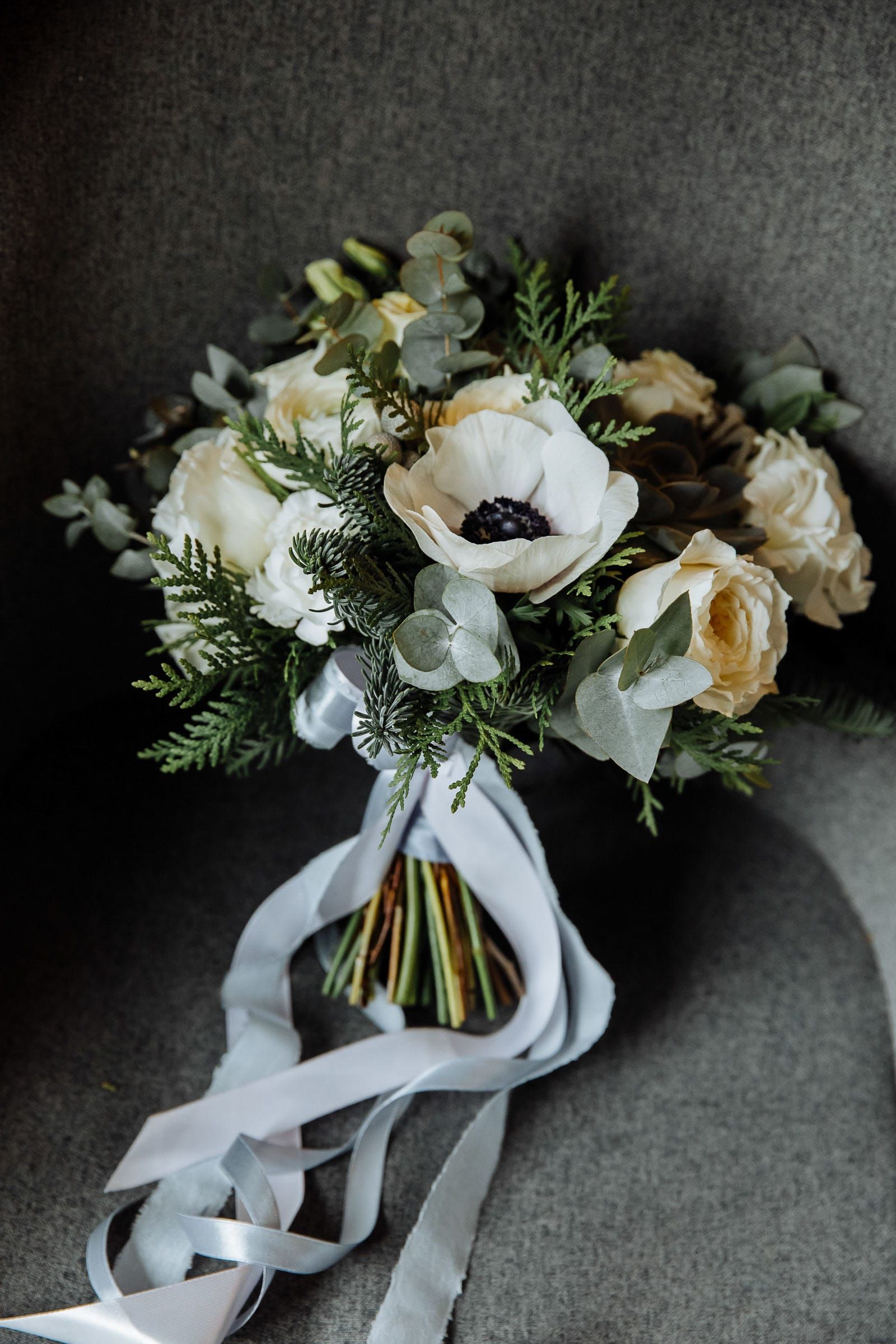 Elegant bridal bouquet photography featuring seasonal blooms from a Cornwall wedding photographer.
