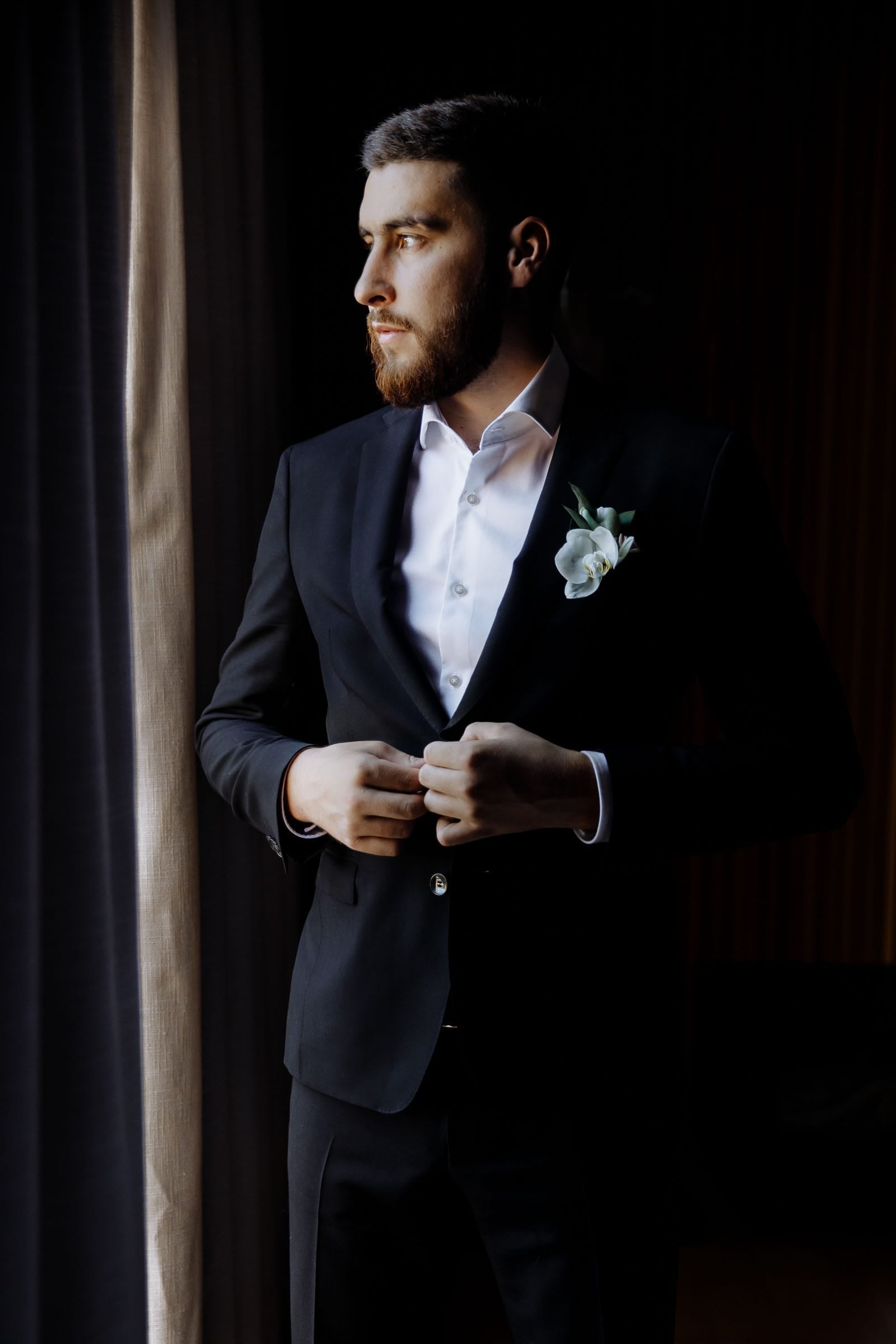 Professional editorial-style groom portrait captured by Tanya Bogdan in Devon.