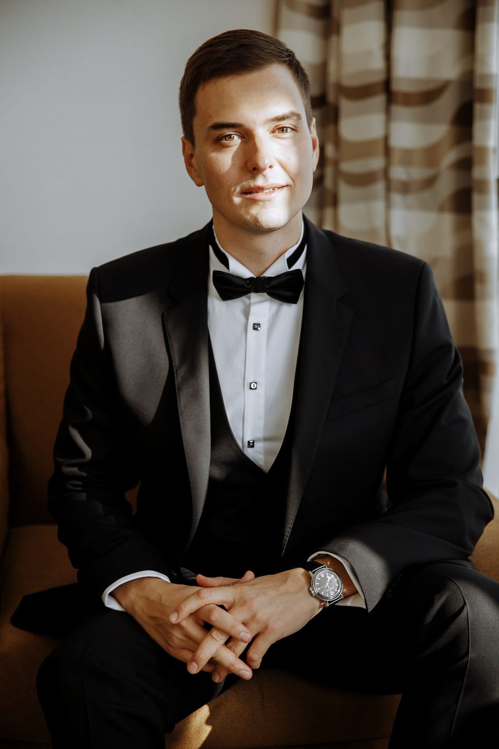 Editorial groom portrait by London wedding photographer Tanya Bogdan.