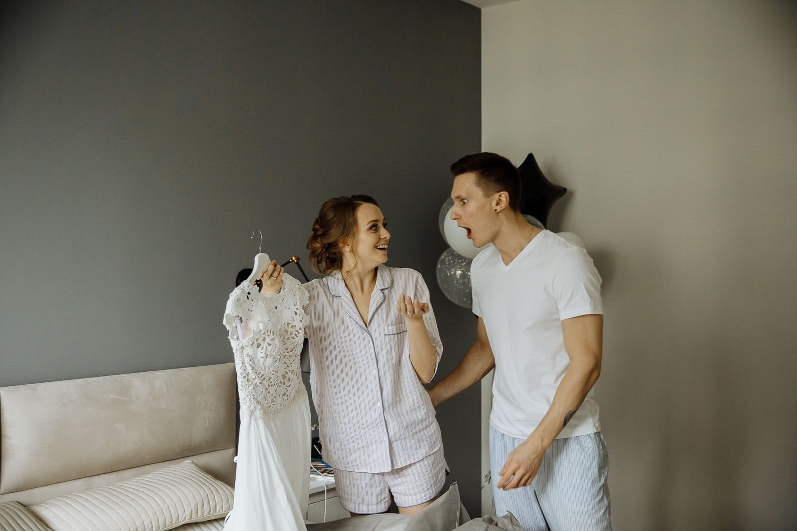Groom's surprise at the first look of the wedding dress, by Tanya Bogdan.