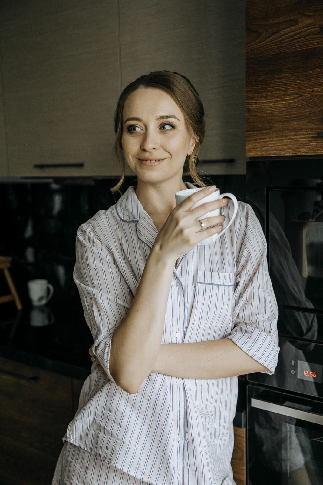 London bride enjoying coffee in an editorial-style morning portrait by Tanya Bogdan.