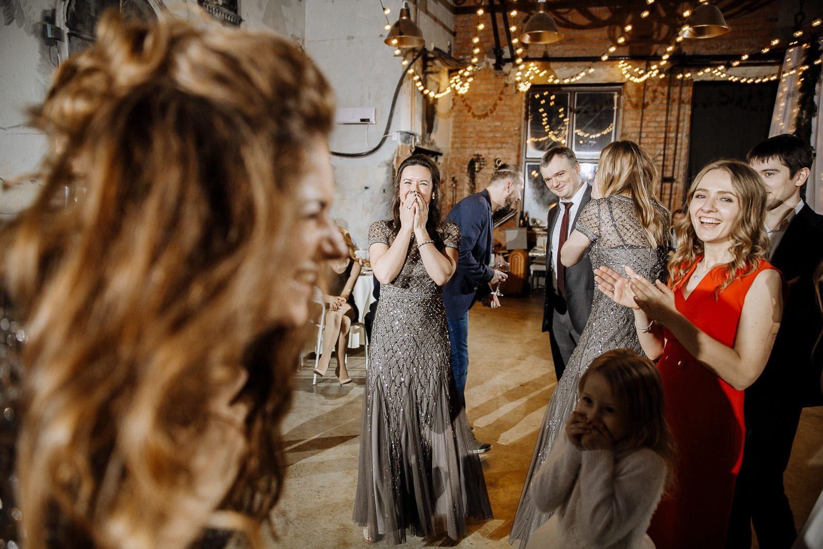 Laughter on the dancefloor from Cornwall wedding photographer Tanya Bogdan.