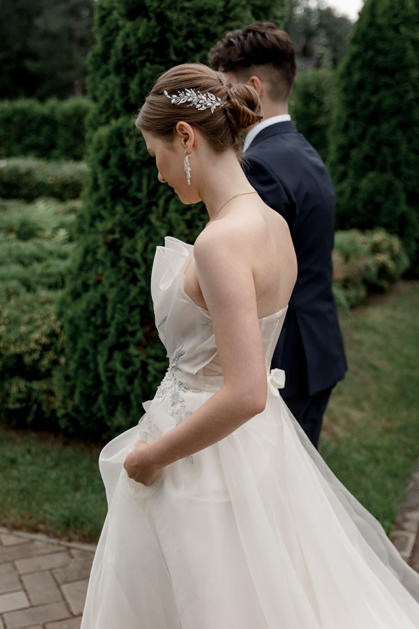 Romantic couple portrait in a garden setting during a destination wedding