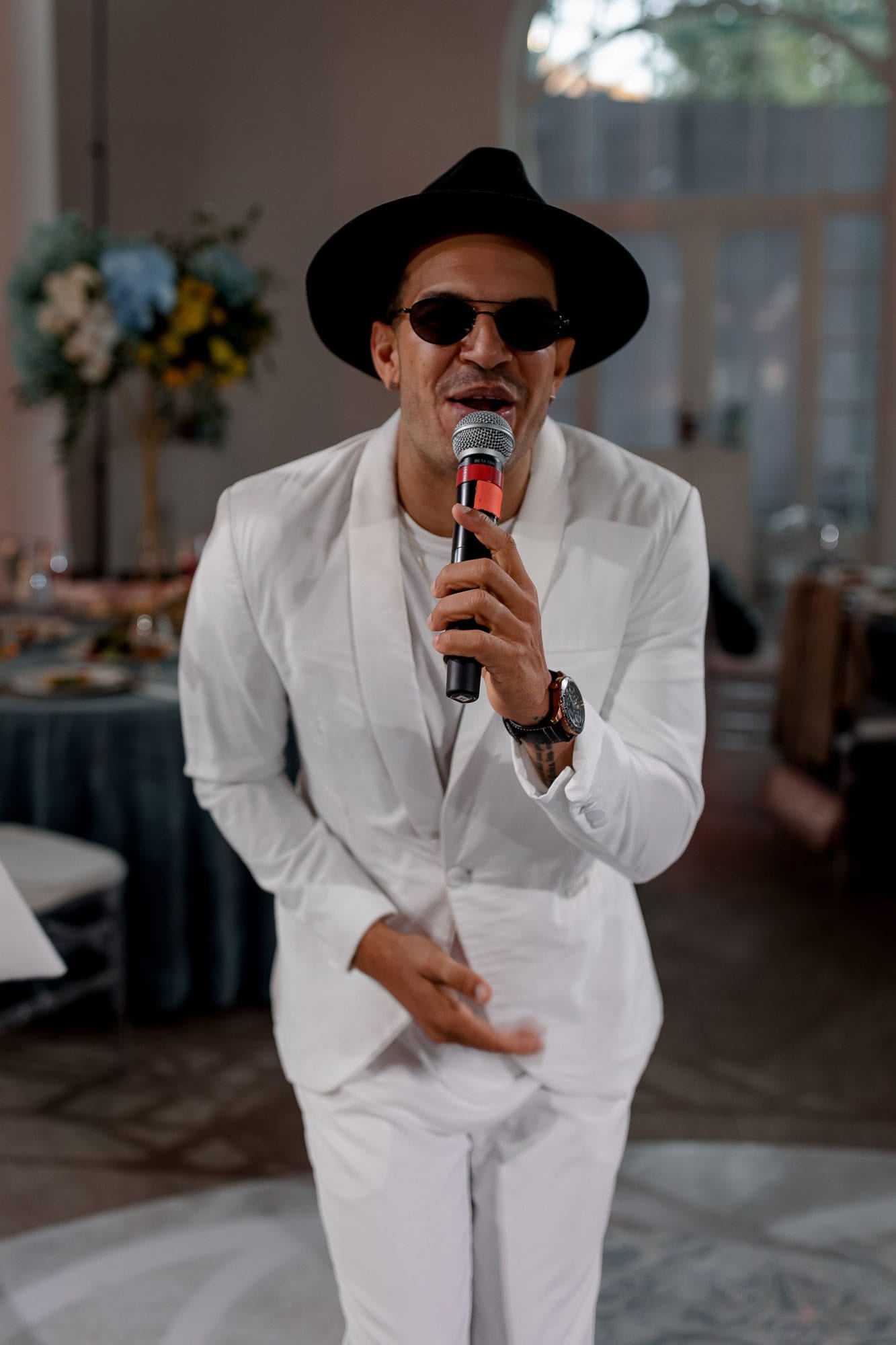 Portrait of a wedding vocalist performing during a destination wedding celebration