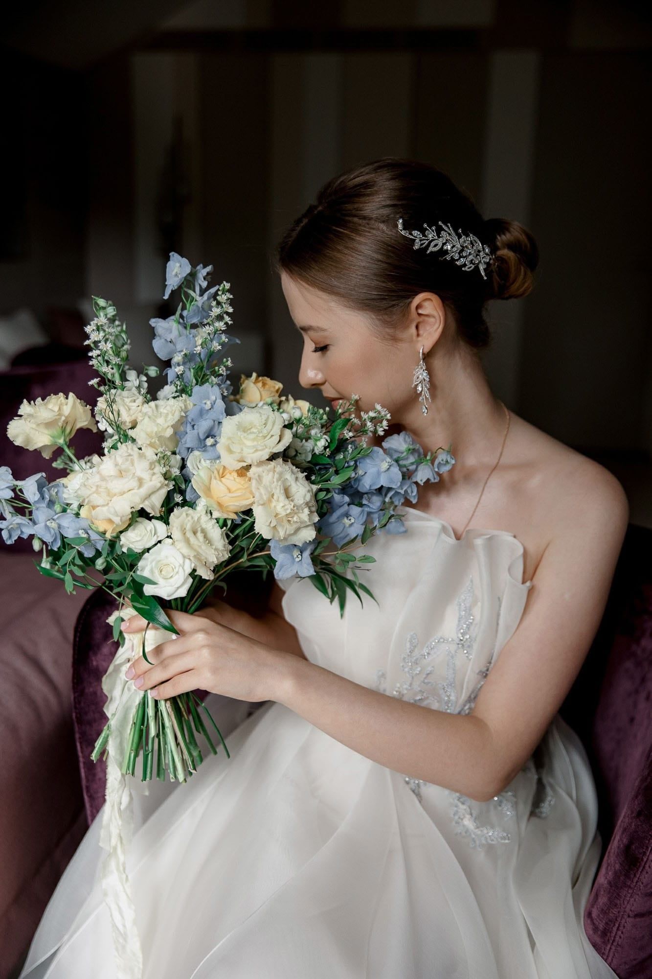 Bride holding her bouquet during morning preparations at a destination wedding