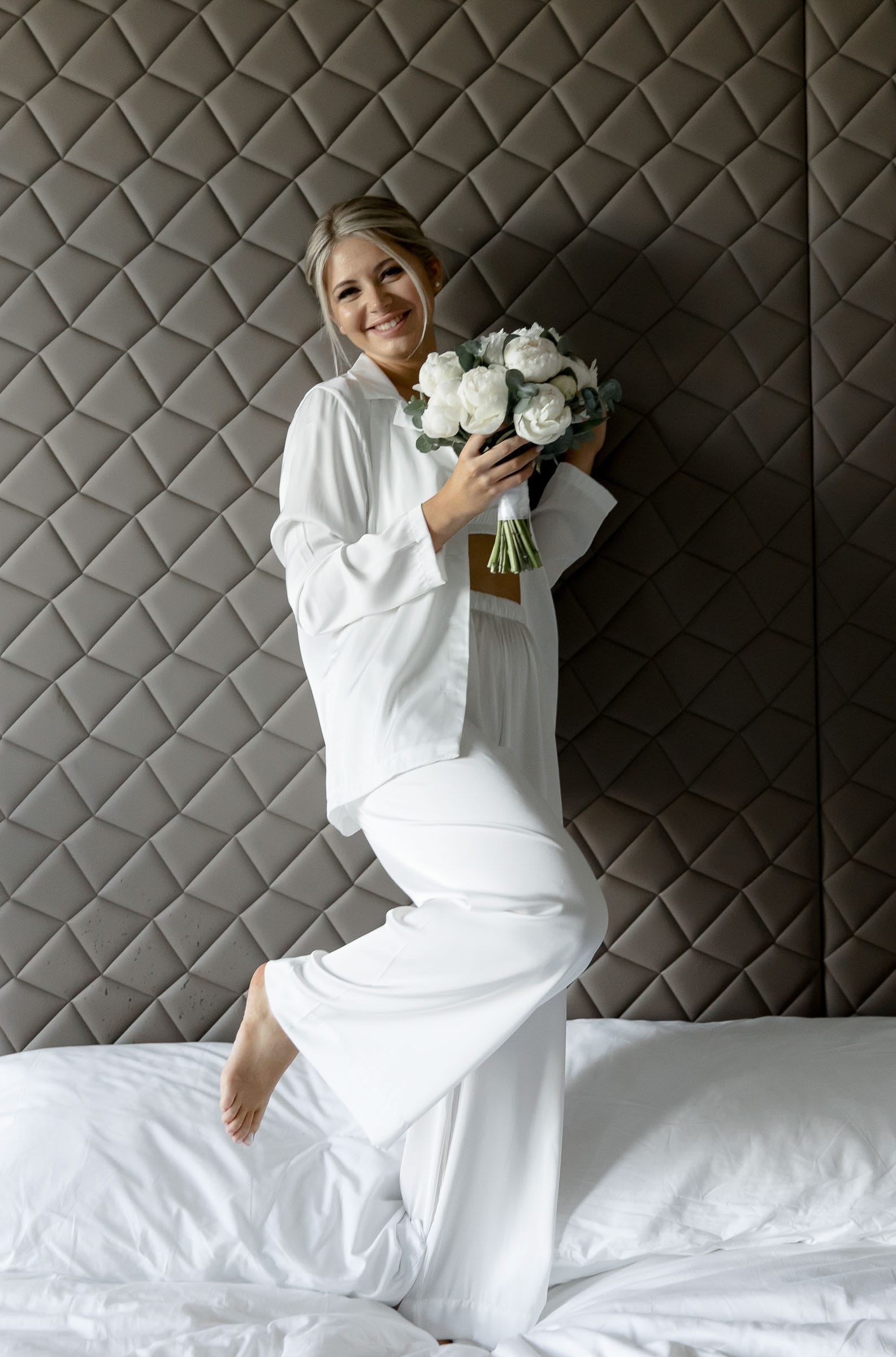 Editorial bridal portrait of the bride holding a bouquet from Bude wedding photographer Tanya Bogdan.