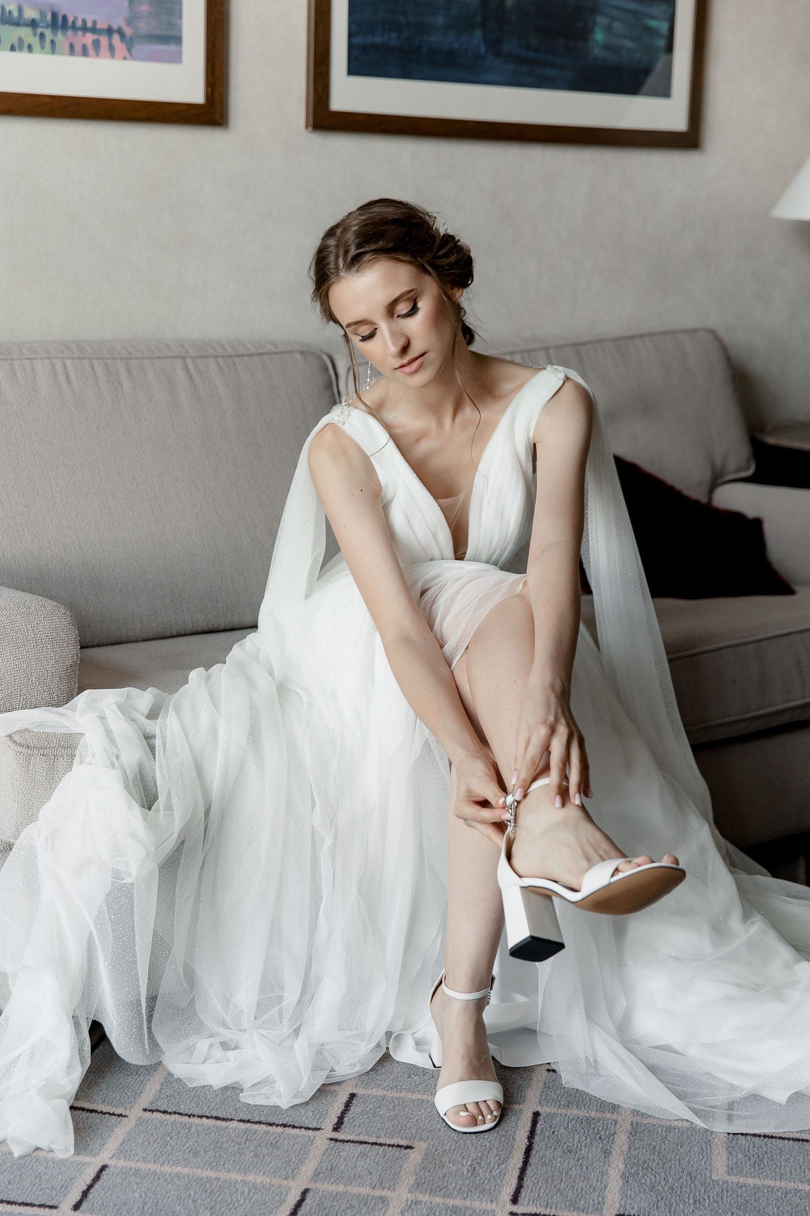 Candid bridal portrait featuring the wedding shoes and styling by Tanya Bogdan.