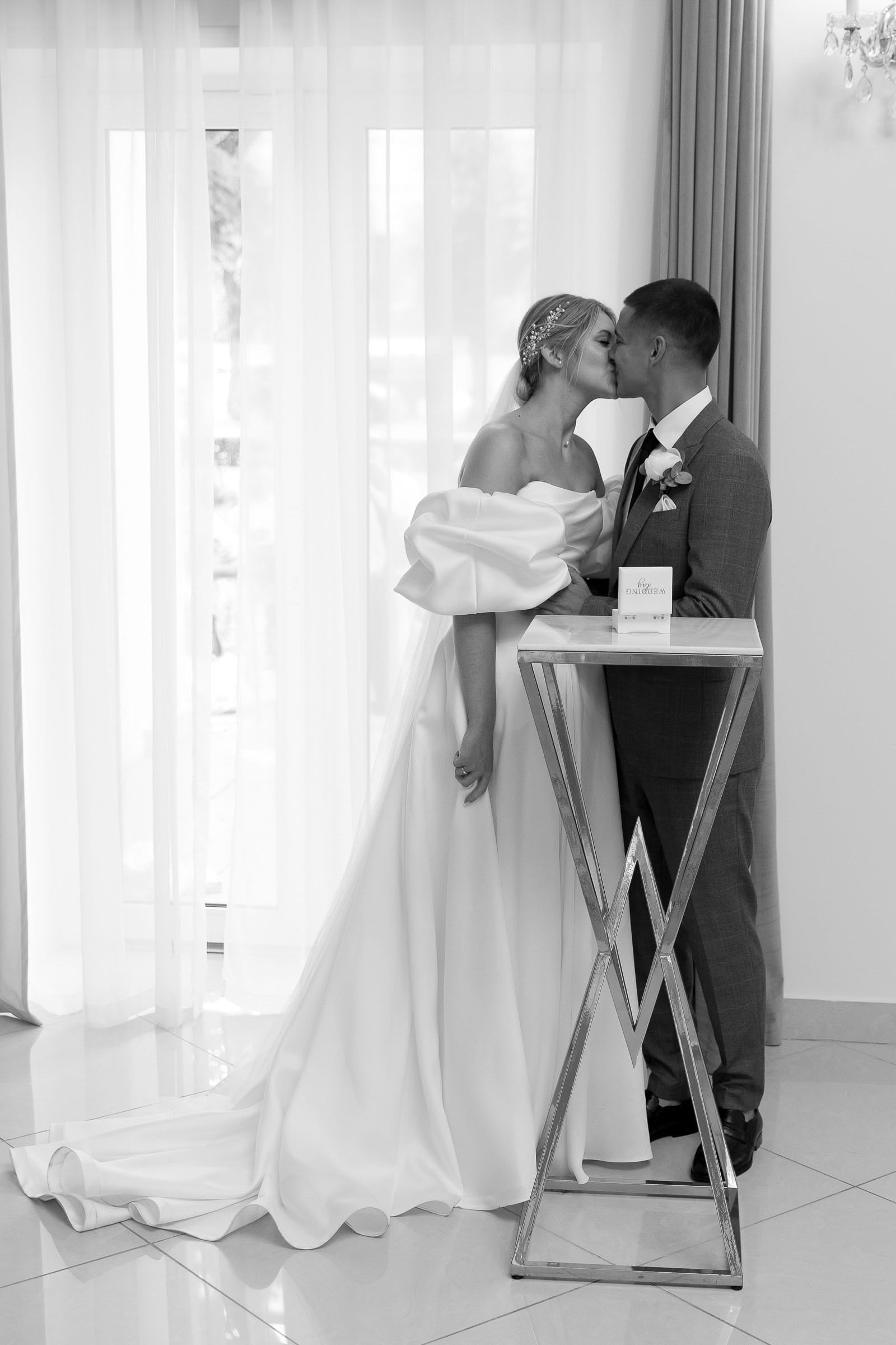 Candid first kiss from Bude wedding photographer Tanya Bogdan.