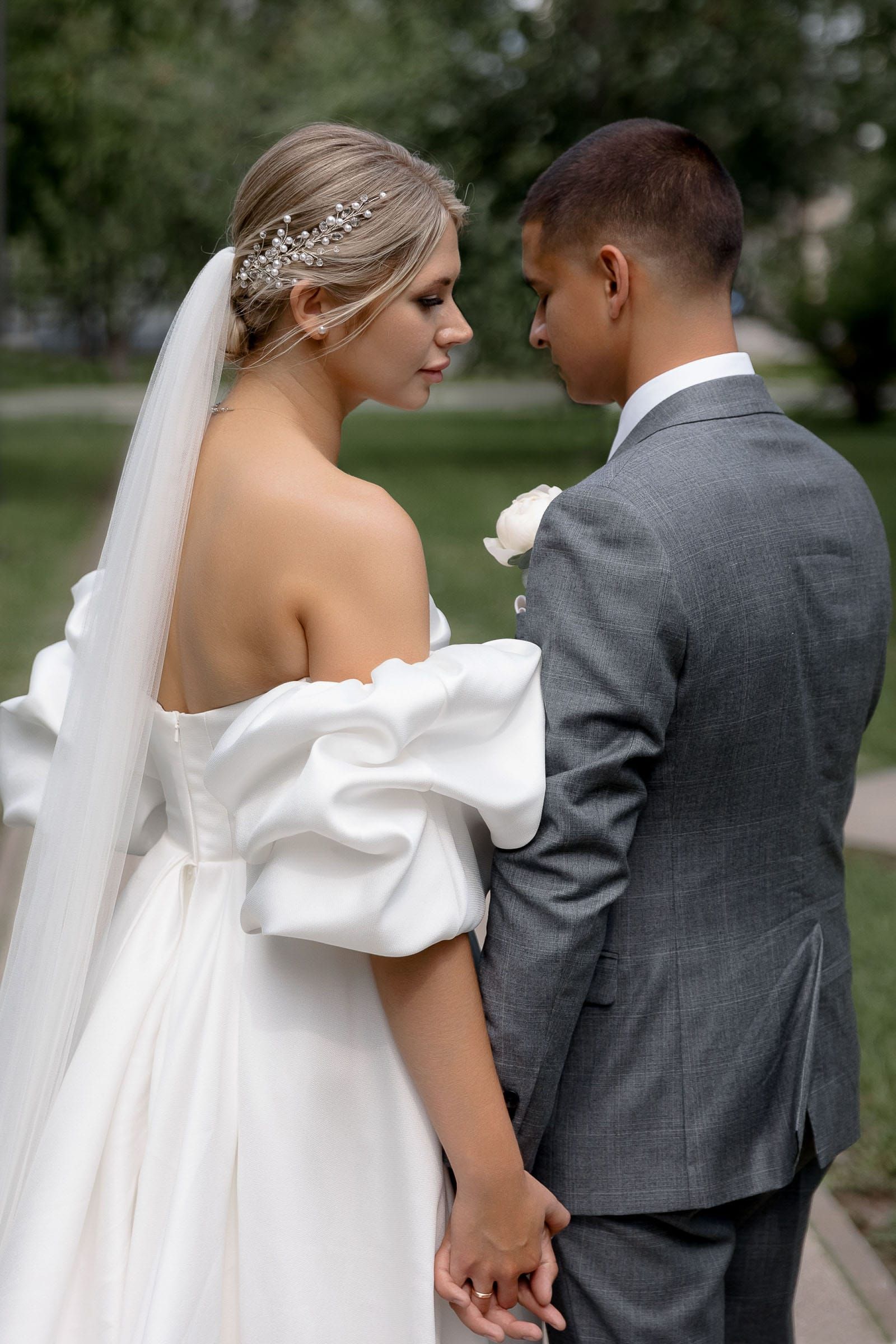 Editorial outdoor portrait of the bride and groom from Cornwall wedding photographer Tanya Bogdan.