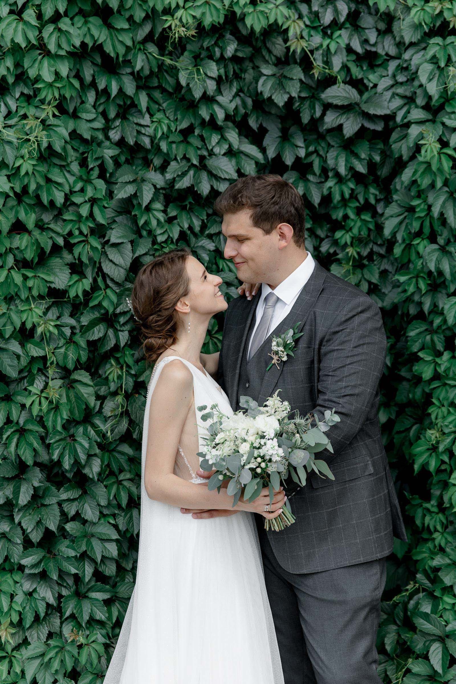 Intimate bridal portraiture capturing quiet wedding moments by a Bude photographer.