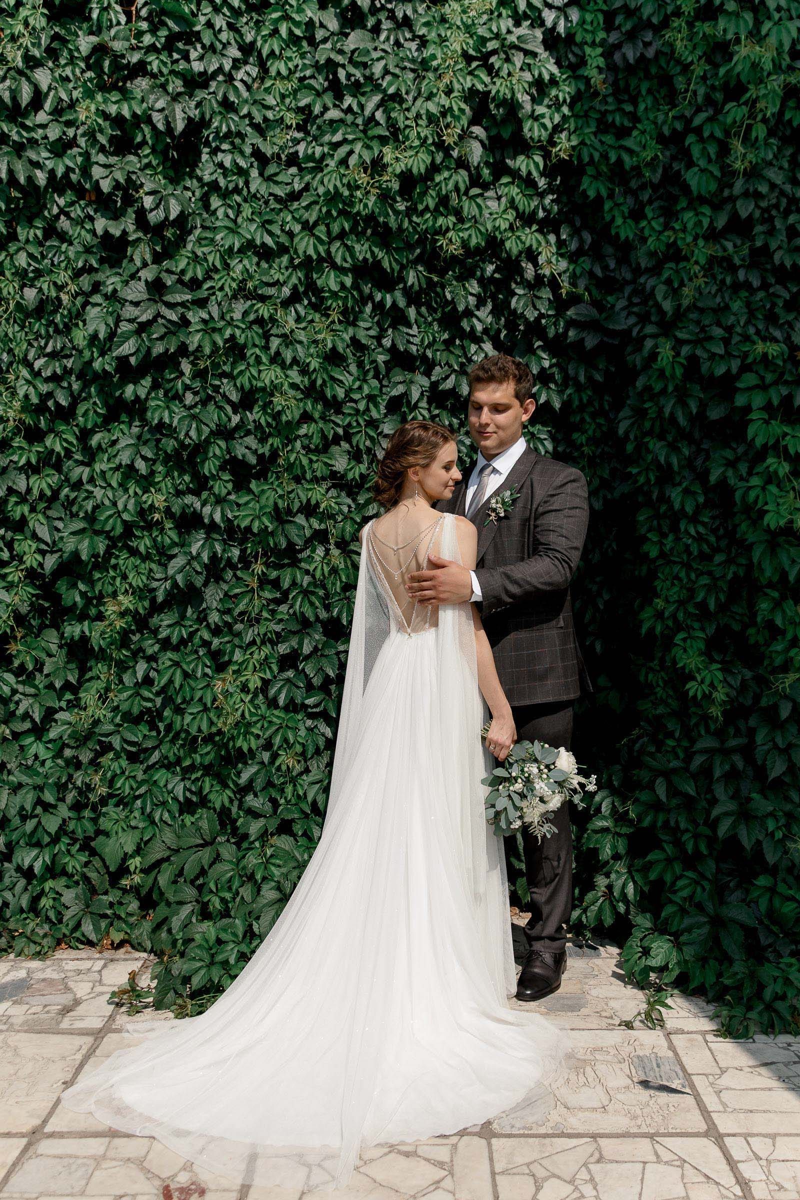 Dramatic and editorial couple portraits by a Devon wedding photographer.