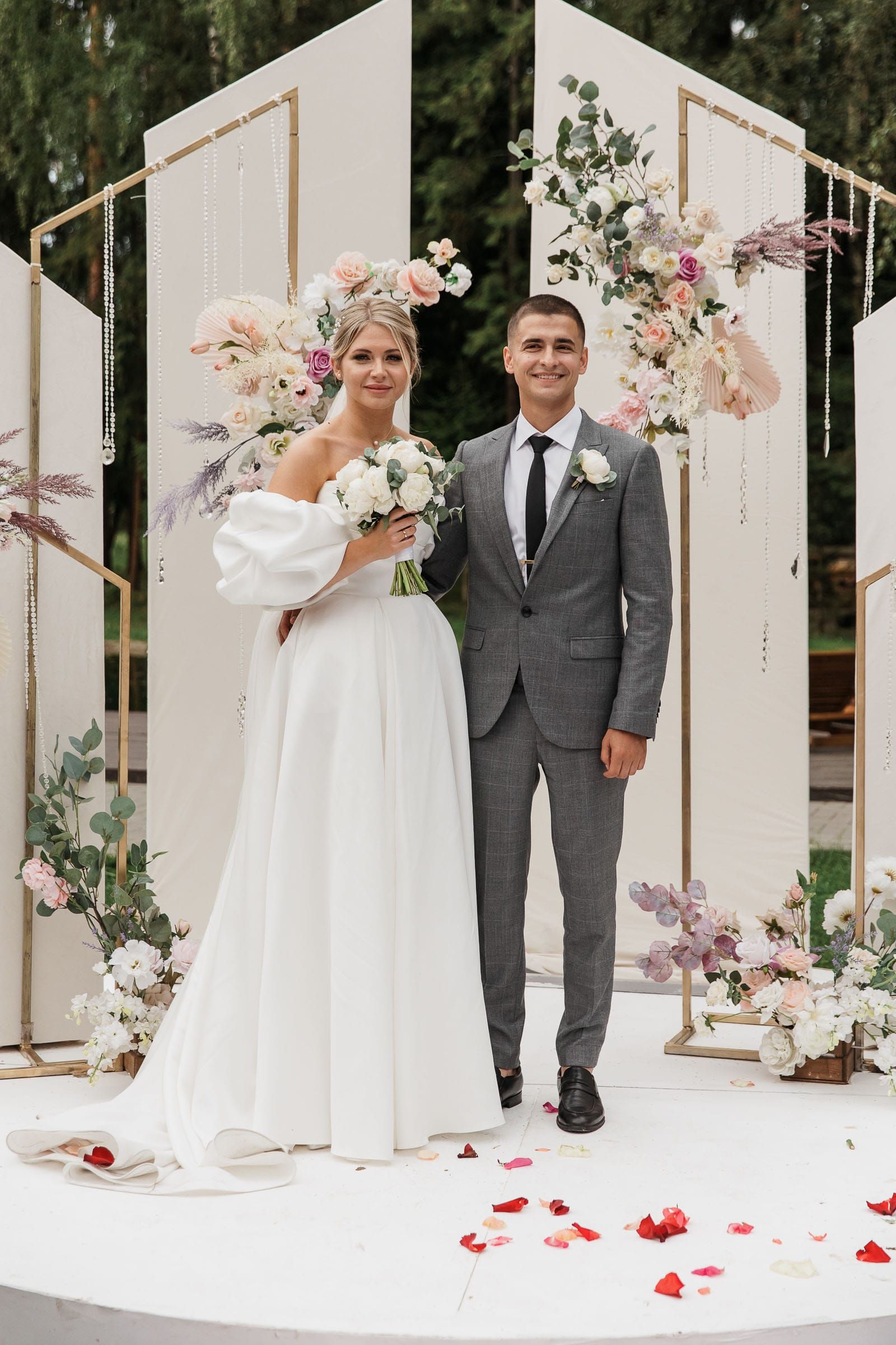 Fine art ceremony portrait of newlyweds at an outdoor venue from Plymouth wedding photographer Tanya Bogdan.