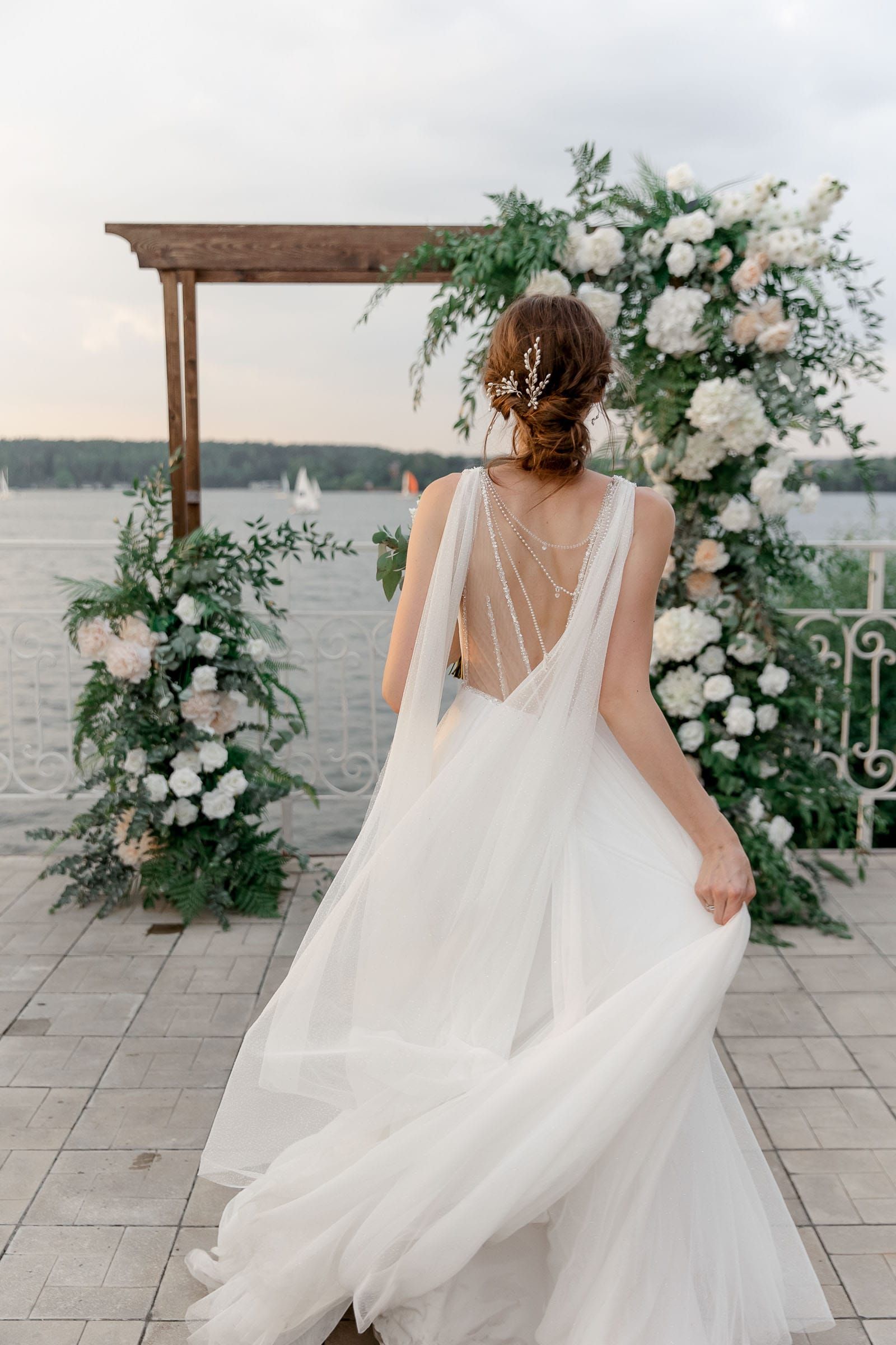 Editorial bridal portrait by the river, captured by Bude wedding photographer Tanya Bogdan.