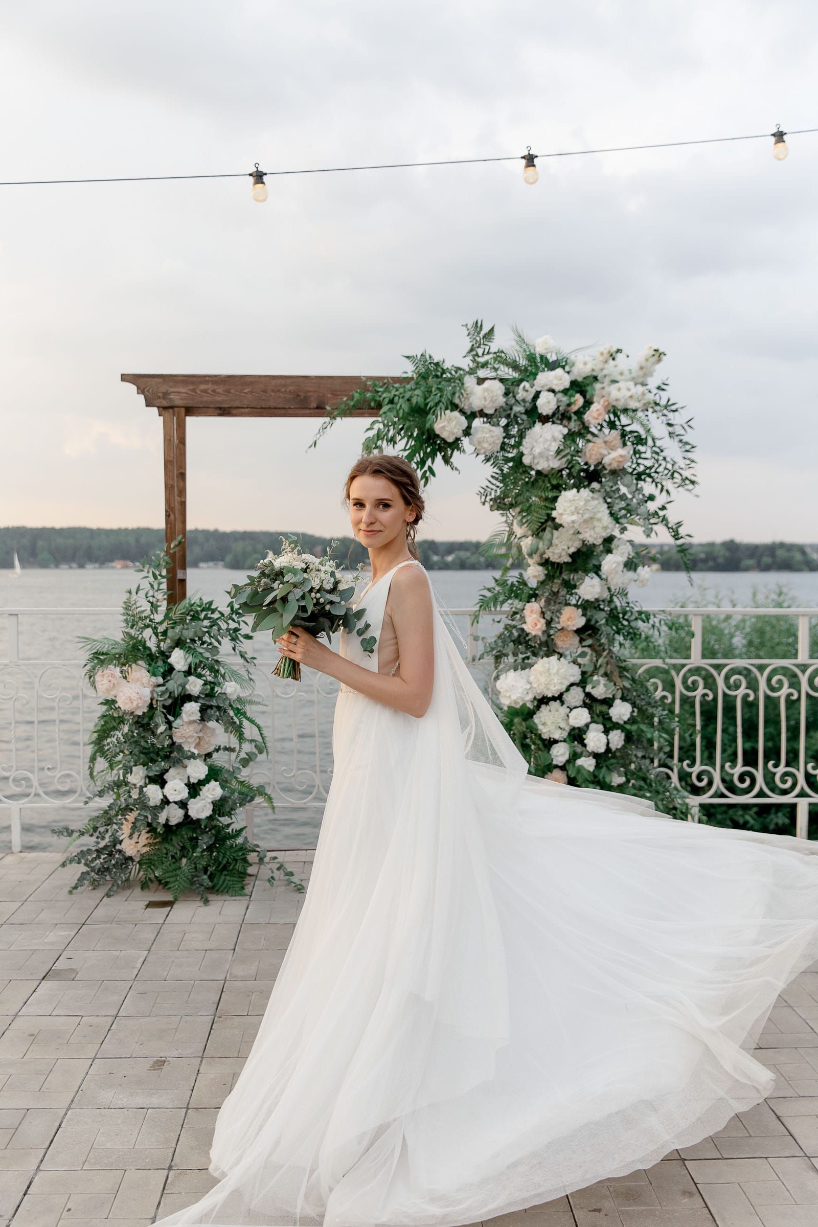 Luxury bridal portrait by the river, captured by South West wedding photographer Tanya Bogdan.