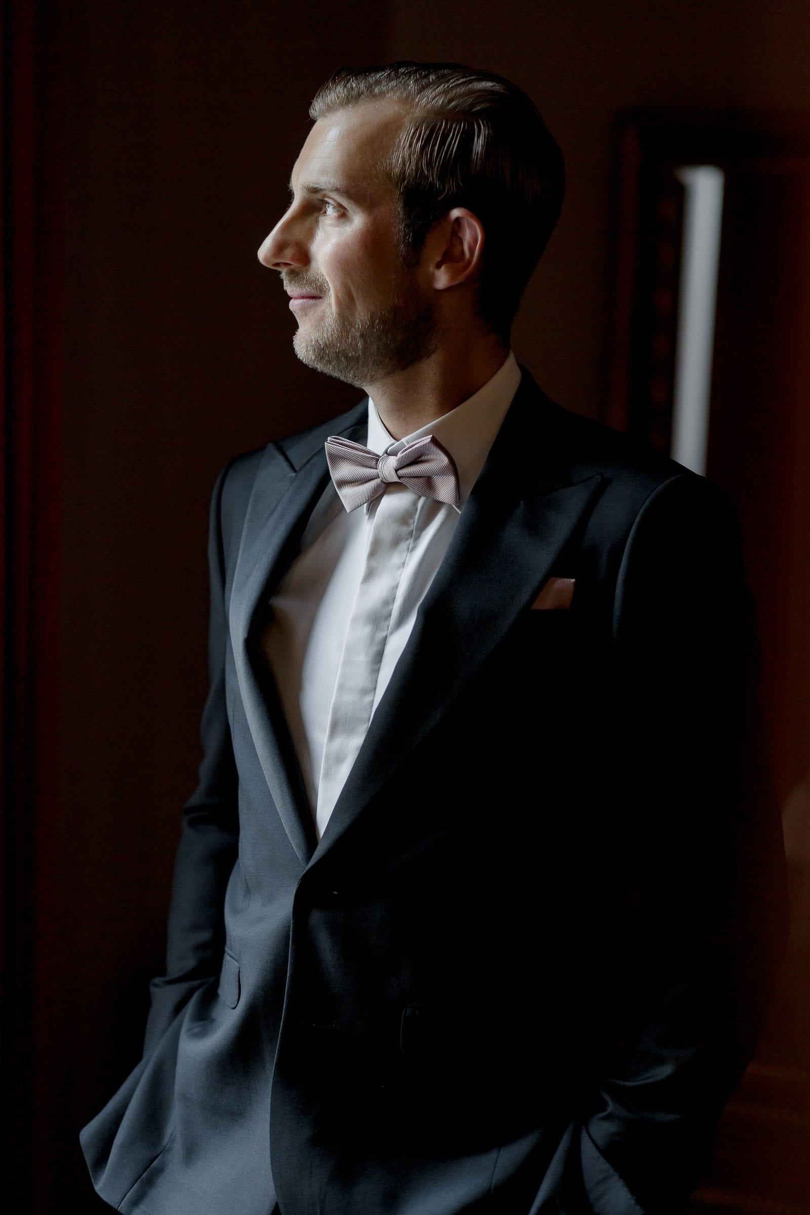 Editorial groom photography with a GQ aesthetic from Tanya Bogdan, available in London.