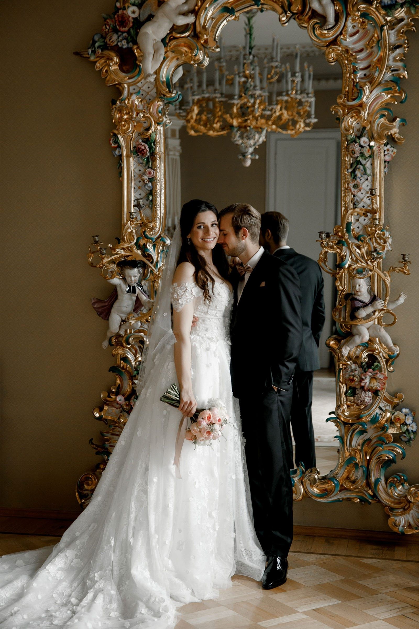 Editorial photography of a first look featuring grand mirrors by Tanya Bogdan, serving Cornwall and the Cotswolds.