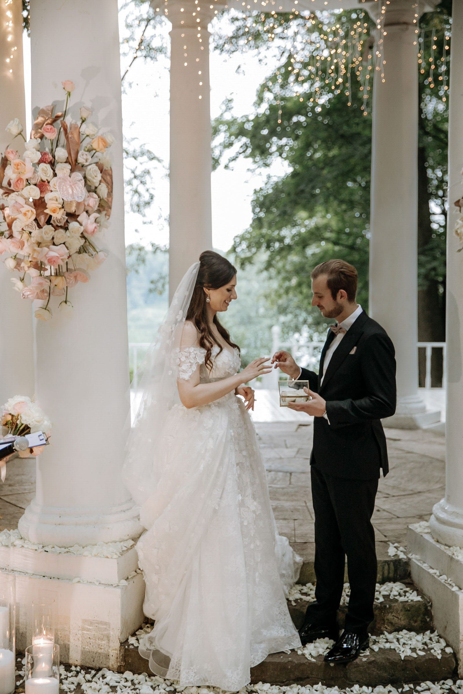 Close-up documentary photography of a ring exchange by Tanya Bogdan, serving Cornwall and the Cotswolds.