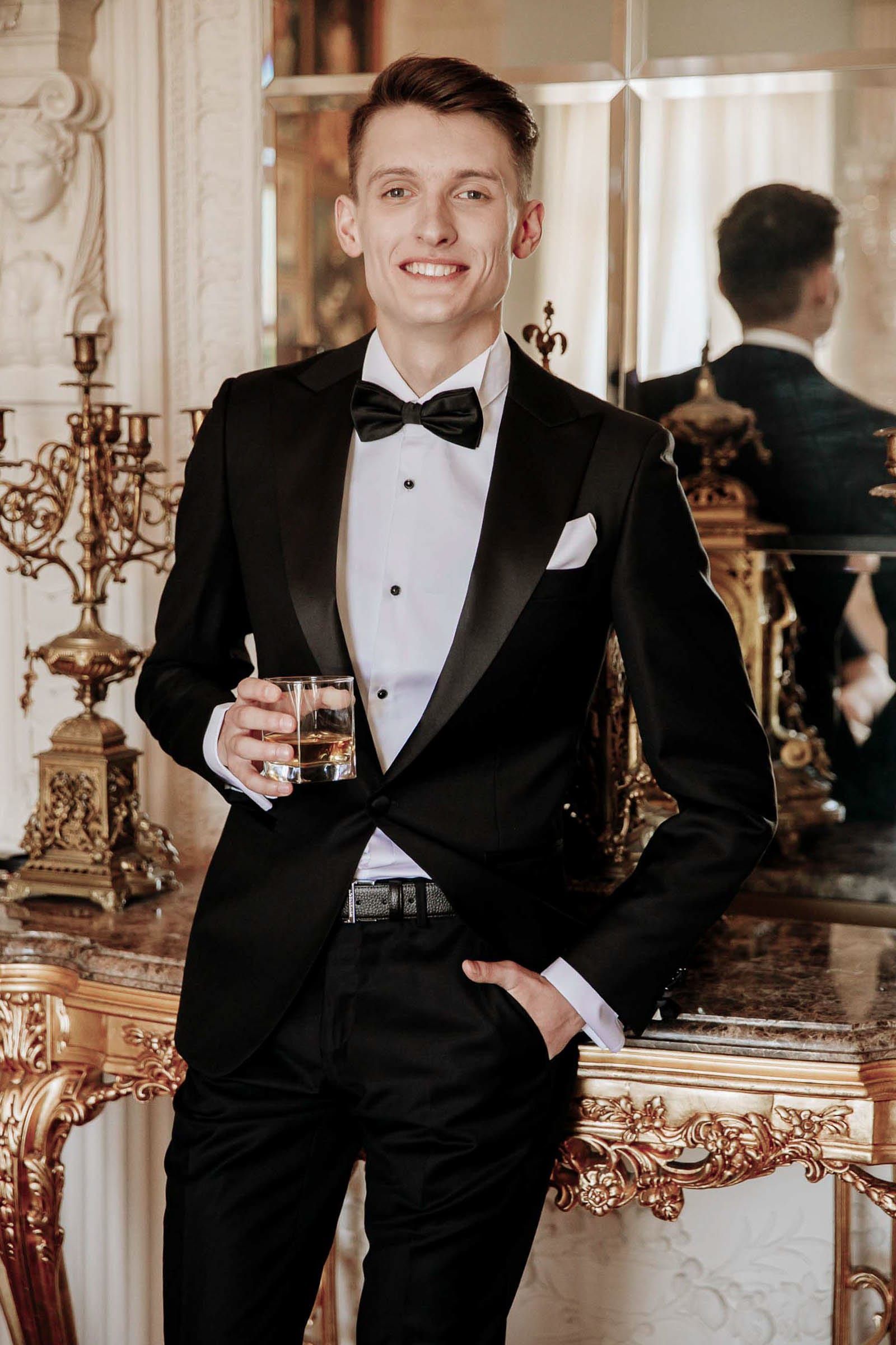 A luxury groom portrait featuring a relaxed moment before the ceremony by London photographer Tanya Bogdan.