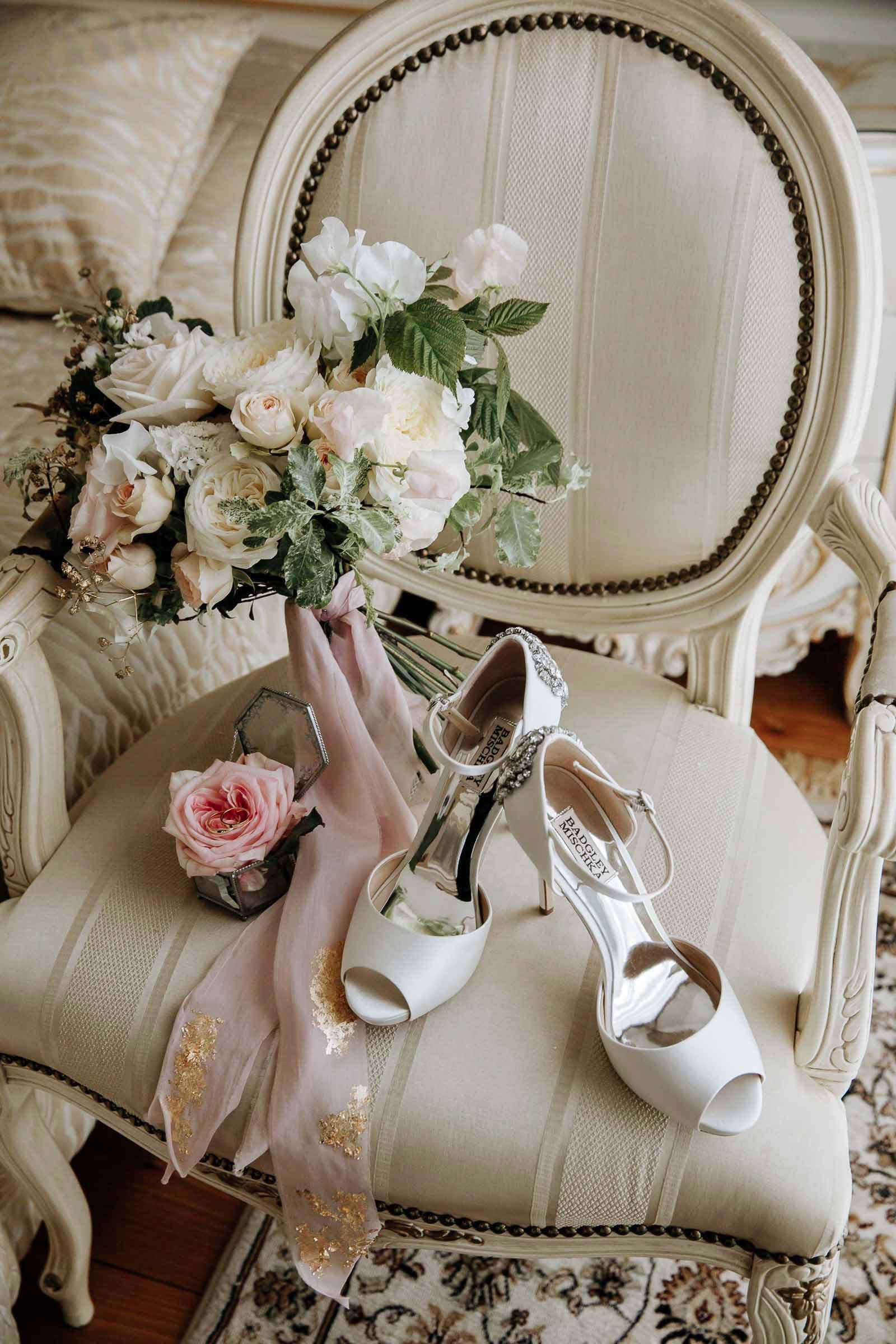 A fine art detail shot of bridal accessories styled at a Tudor-style venue by London photographer Tanya Bogdan.