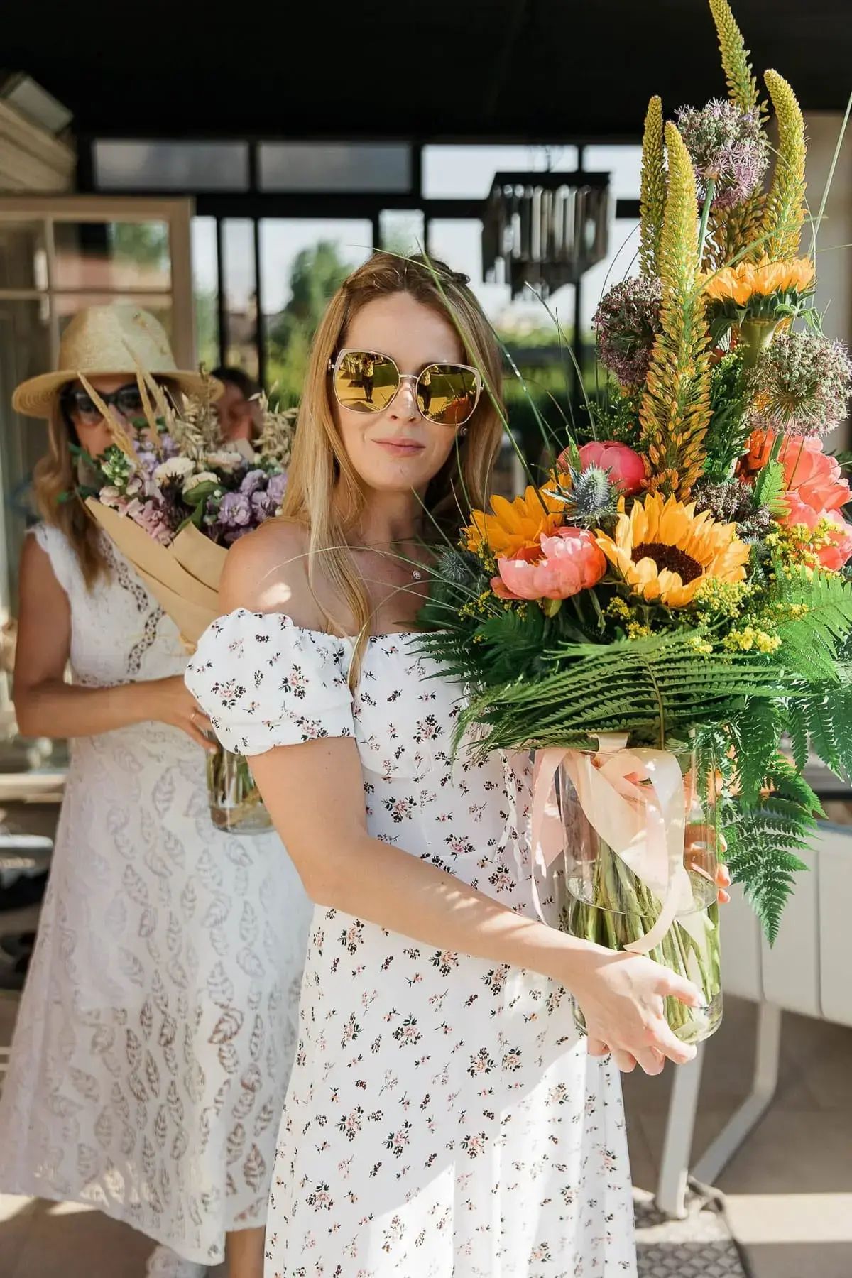 A professional individual portrait of a guest attending a bespoke garden party, by Exeter photographer Tanya Bogdan.