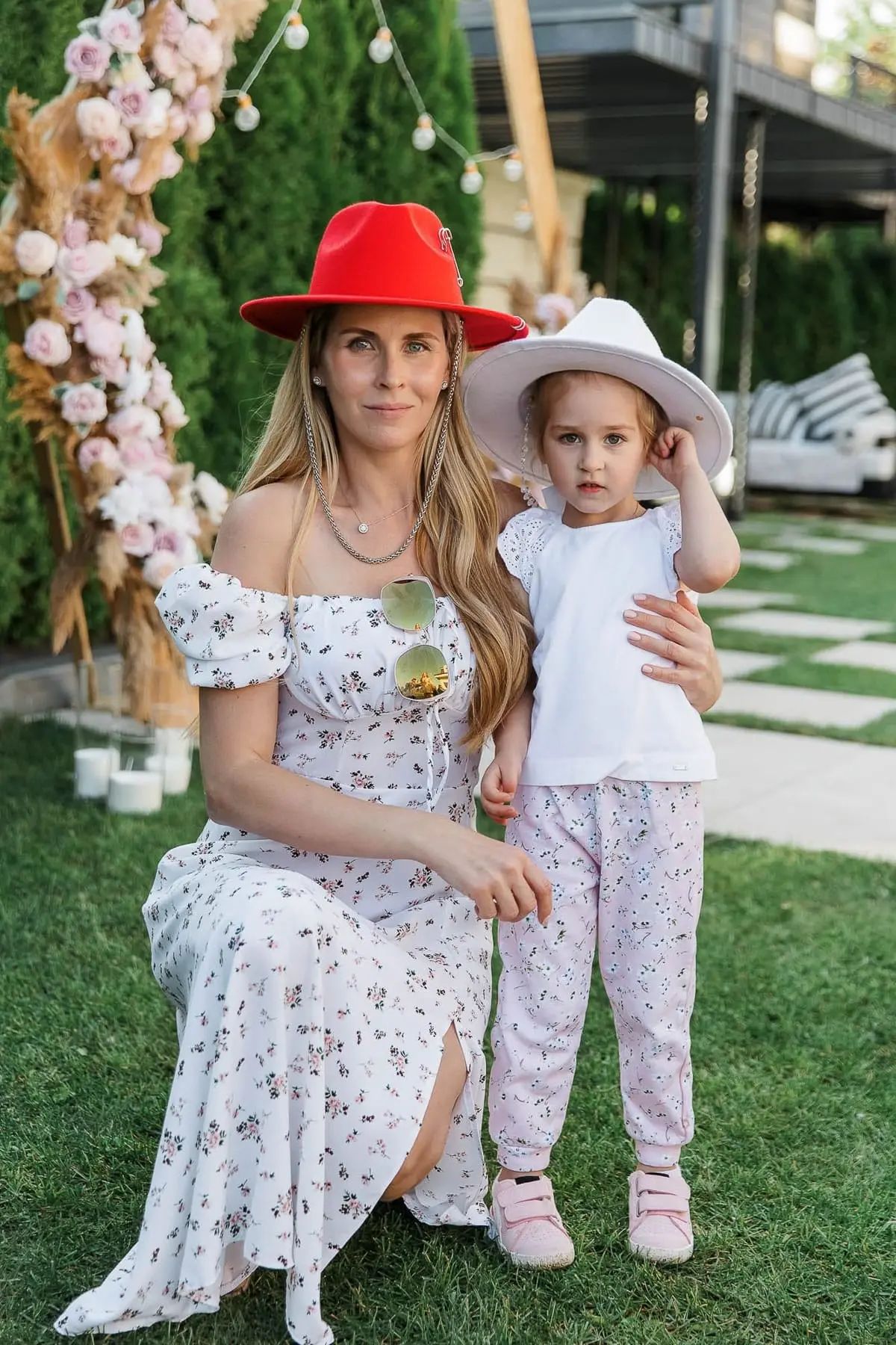 A tender portrait of a mother and daughter surrounded by luxury ambience, by Bude photographer Tanya Bogdan.