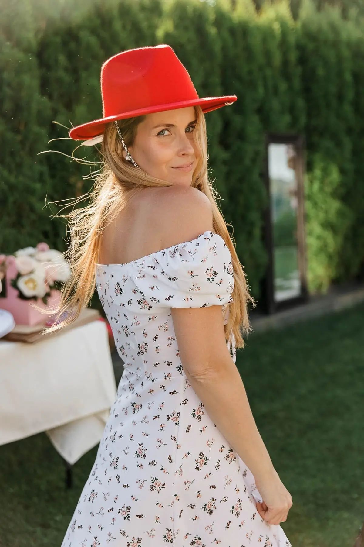 A lifestyle portrait focusing on summer fashion and style at an outdoor celebration, by Falmouth photographer Tanya Bogdan.