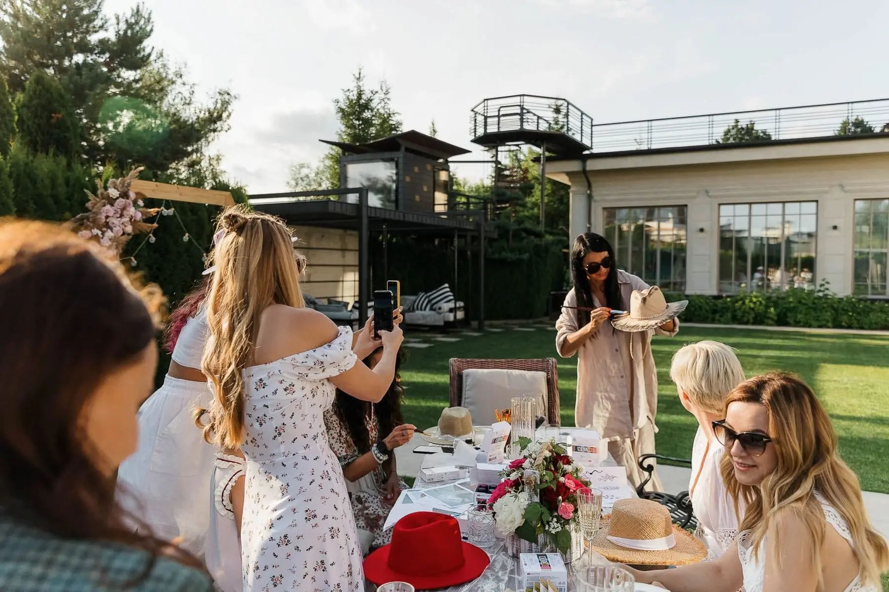 Guests mingling and socialising at a luxury outdoor event, by St Ives photographer Tanya Bogdan.