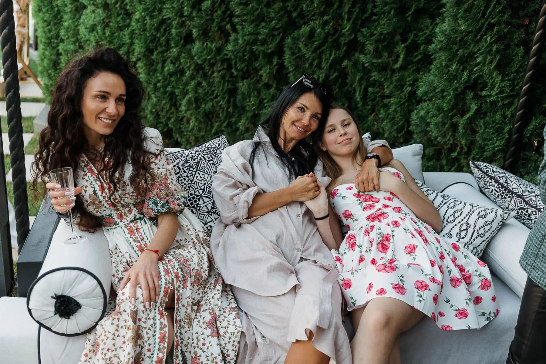 A candid shot capturing the lively and elegant atmosphere of a garden party, by Newquay photographer Tanya Bogdan.