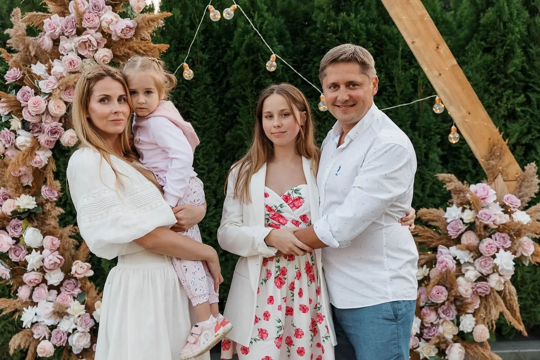 High-end family photography in a lush garden setting by Cornwall lifestyle photographer Tanya Bogdan.