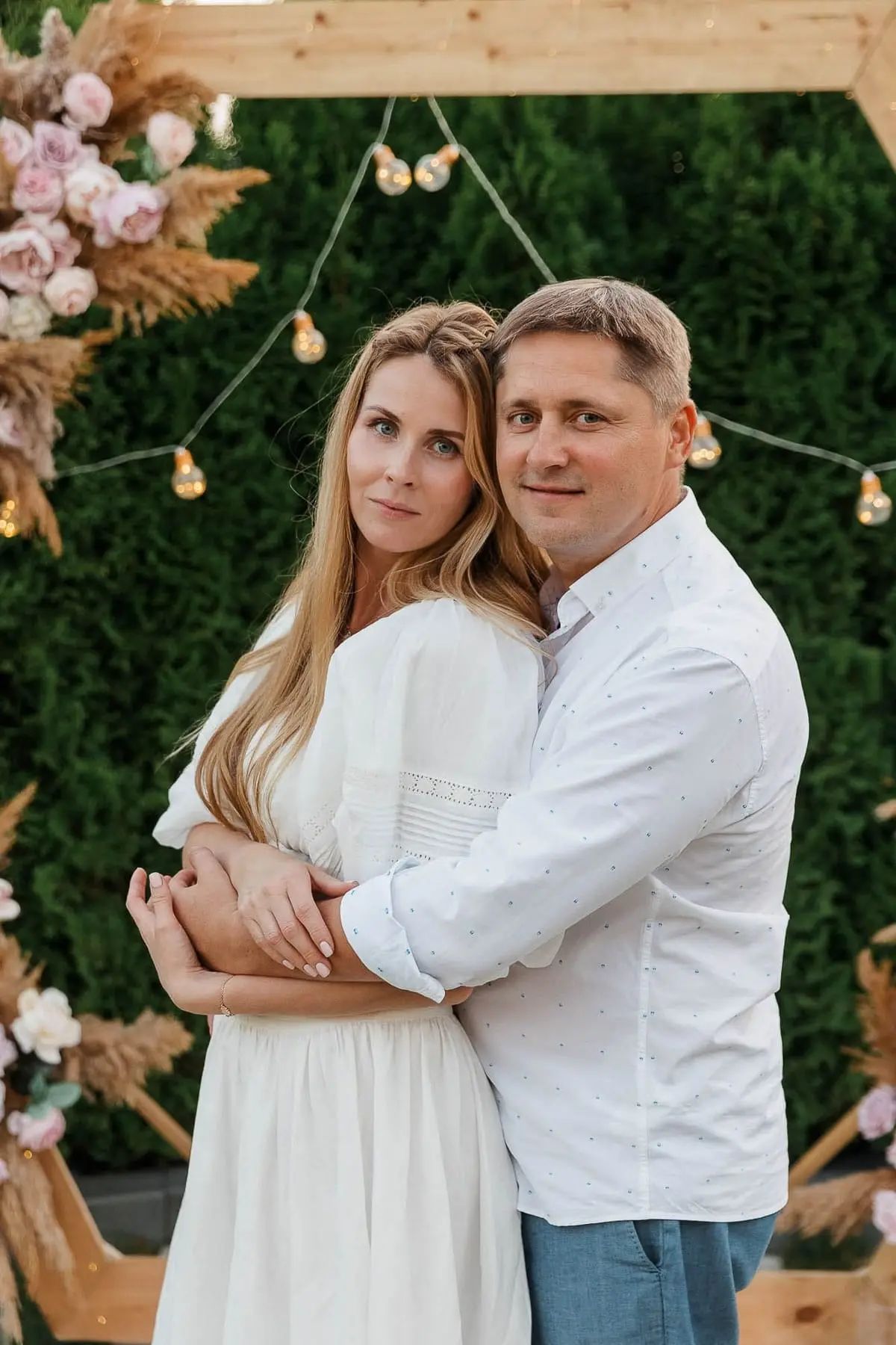 A beautiful portrait of a couple sharing a moment in an elegant setting, by Bude photographer Tanya Bogdan.