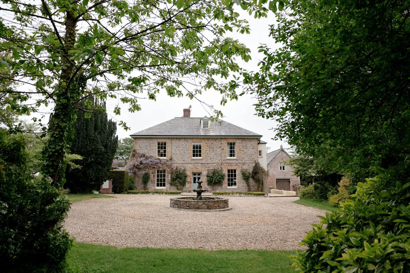 Glebe Barn wedding venue in Devon, photographed during a summer wedding.