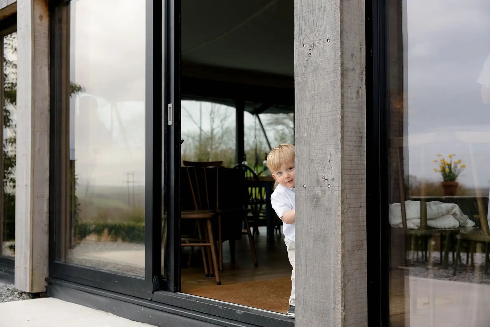Child standing a wedding at Trevenna in Cornwall