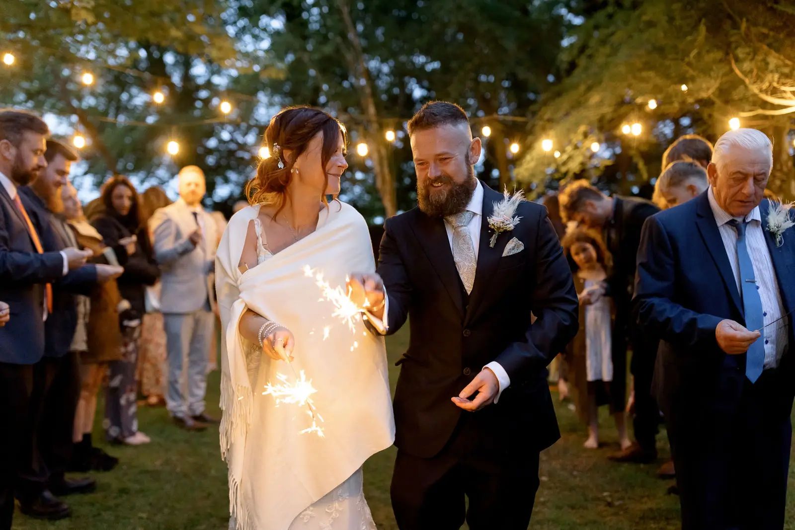 A bride and groom sparkler wedding exit at Glebe Barn in Devon.
