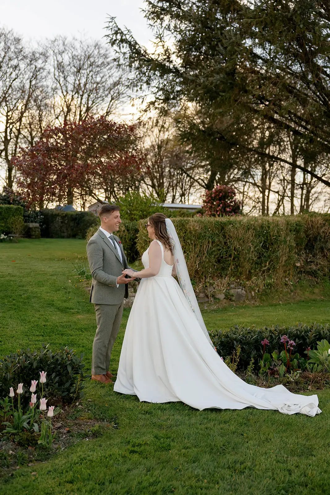 Couple photographed together during their Trevenna wedding