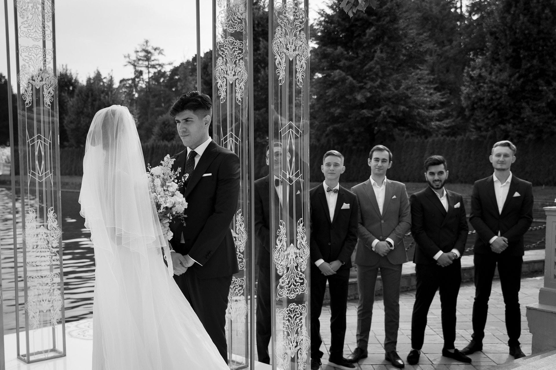 Bride and groom standing together during their destination wedding ceremony
