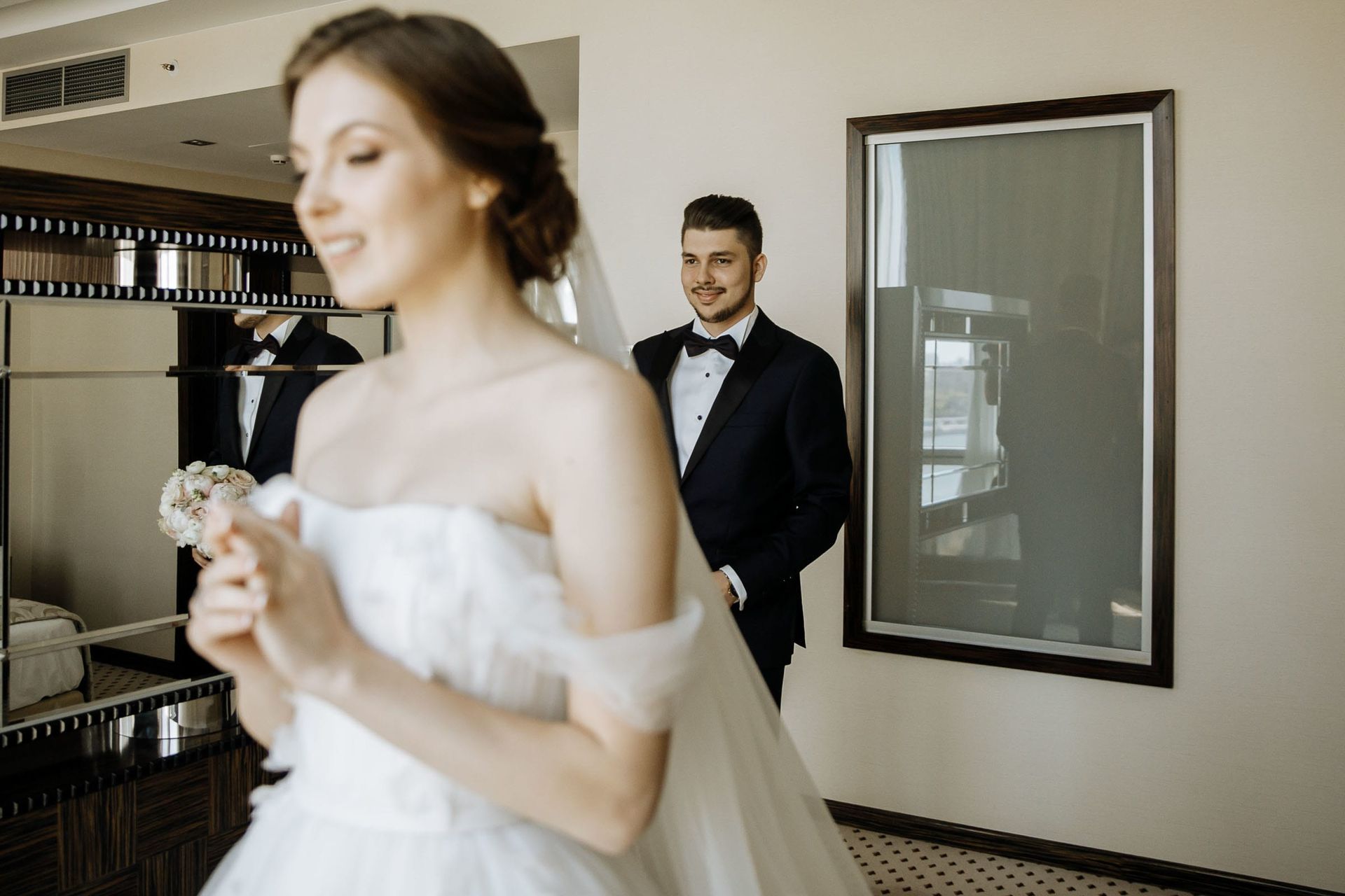 An emotional first look moment between the bride and groom, by a South West wedding photographer, Tanya Bogdan.