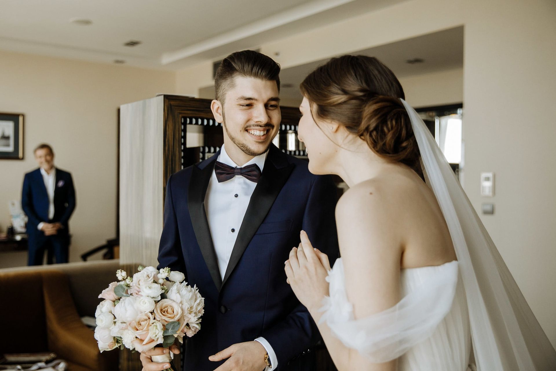 Raw, emotional reaction of the bride and groom during their first look, by a Devon wedding photographer, Tanya Bogdan.