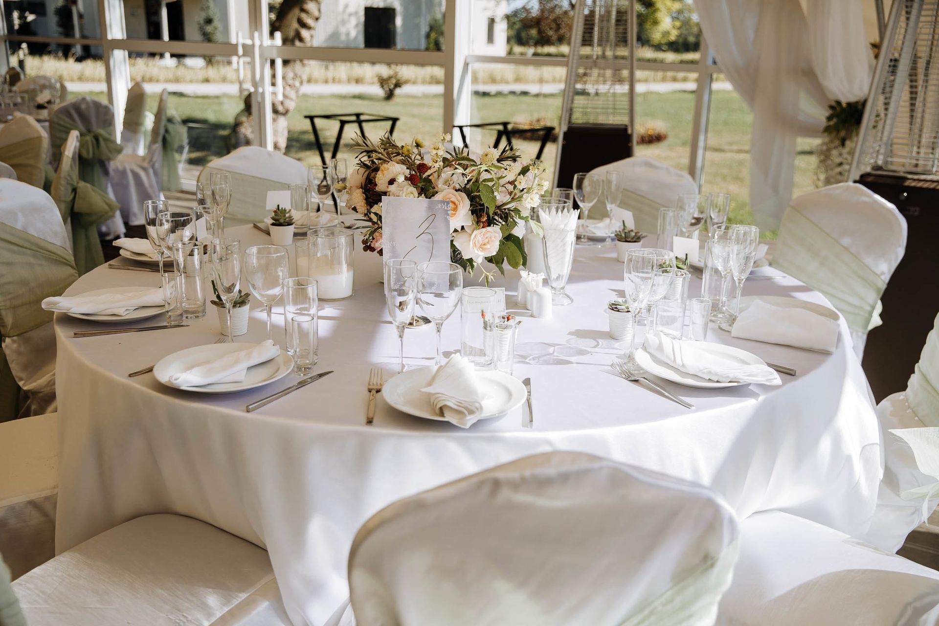 Luxury wedding table styling and floral arrangements, by a Devon wedding photographer, Tanya Bogdan.