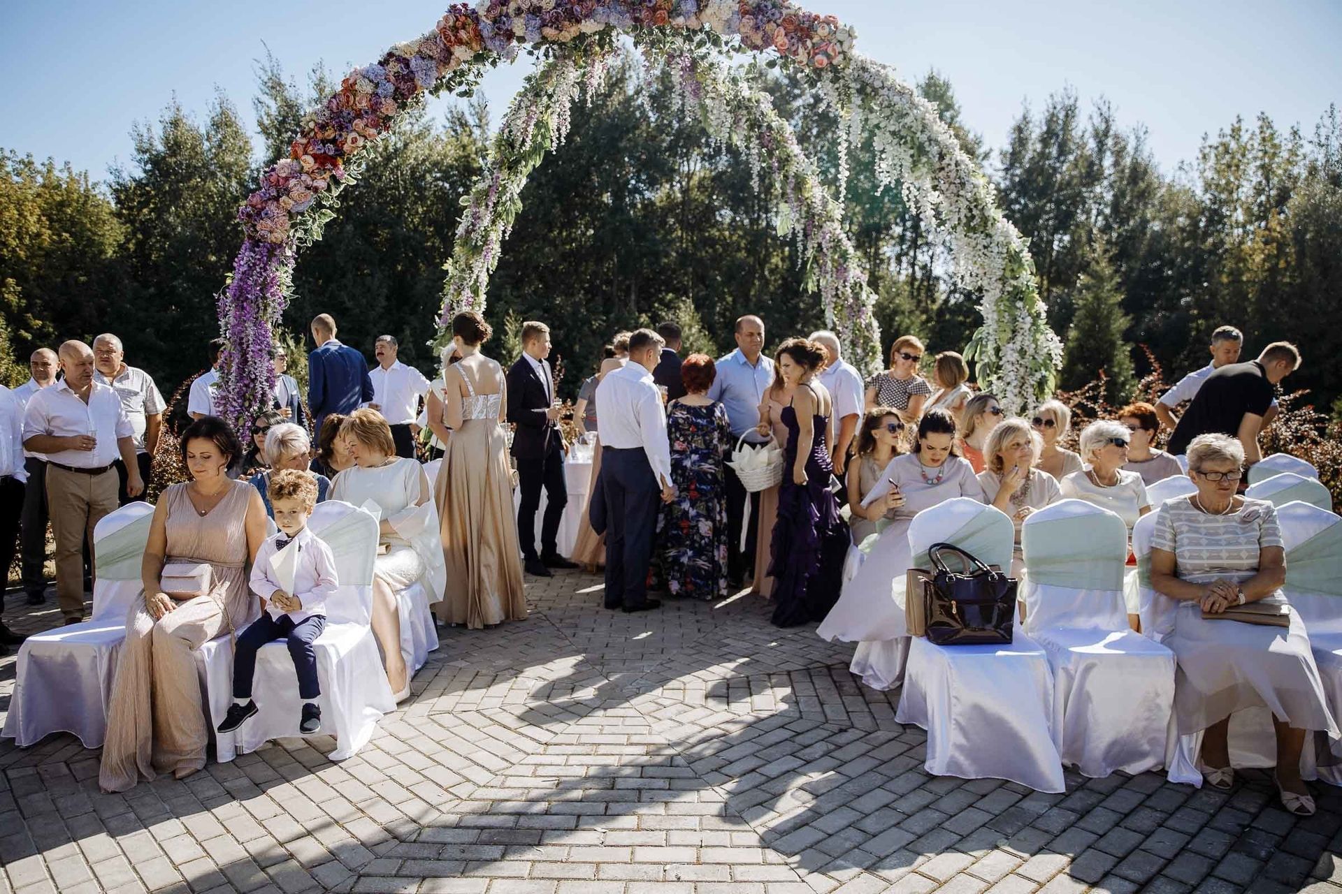 A wide cinematic shot of a grand outdoor wedding venue in the South West, by a South West wedding photographer, Tanya Bogdan.