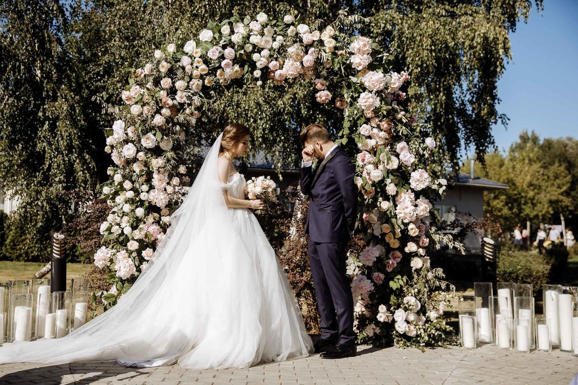 Close-up of an emotional groom waiting at the altar, by a Devon wedding photographer, Tanya Bogdan.
