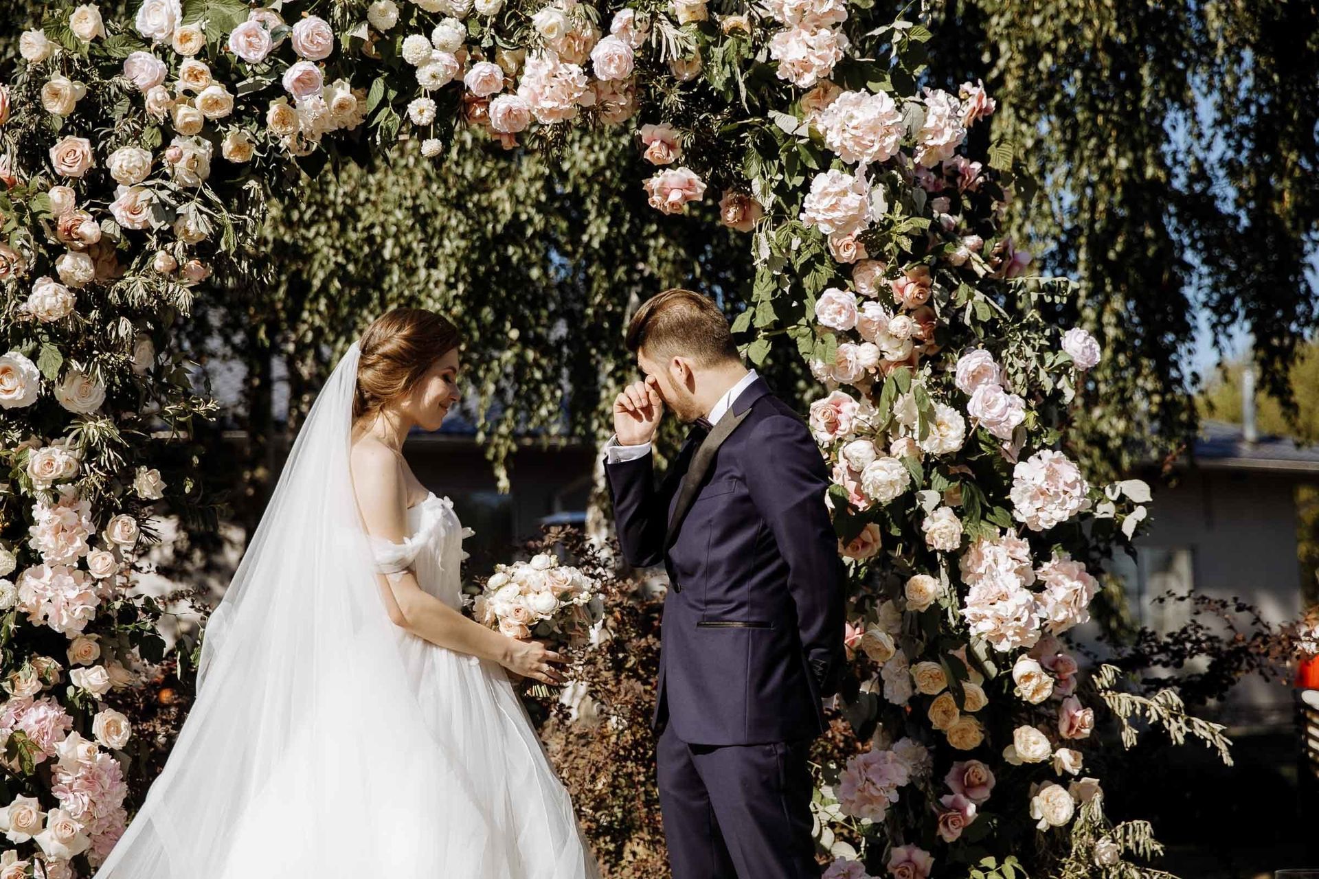 Tight documentary shot of a groom’s emotional reaction, by a Cornwall wedding photographer, Tanya Bogdan.