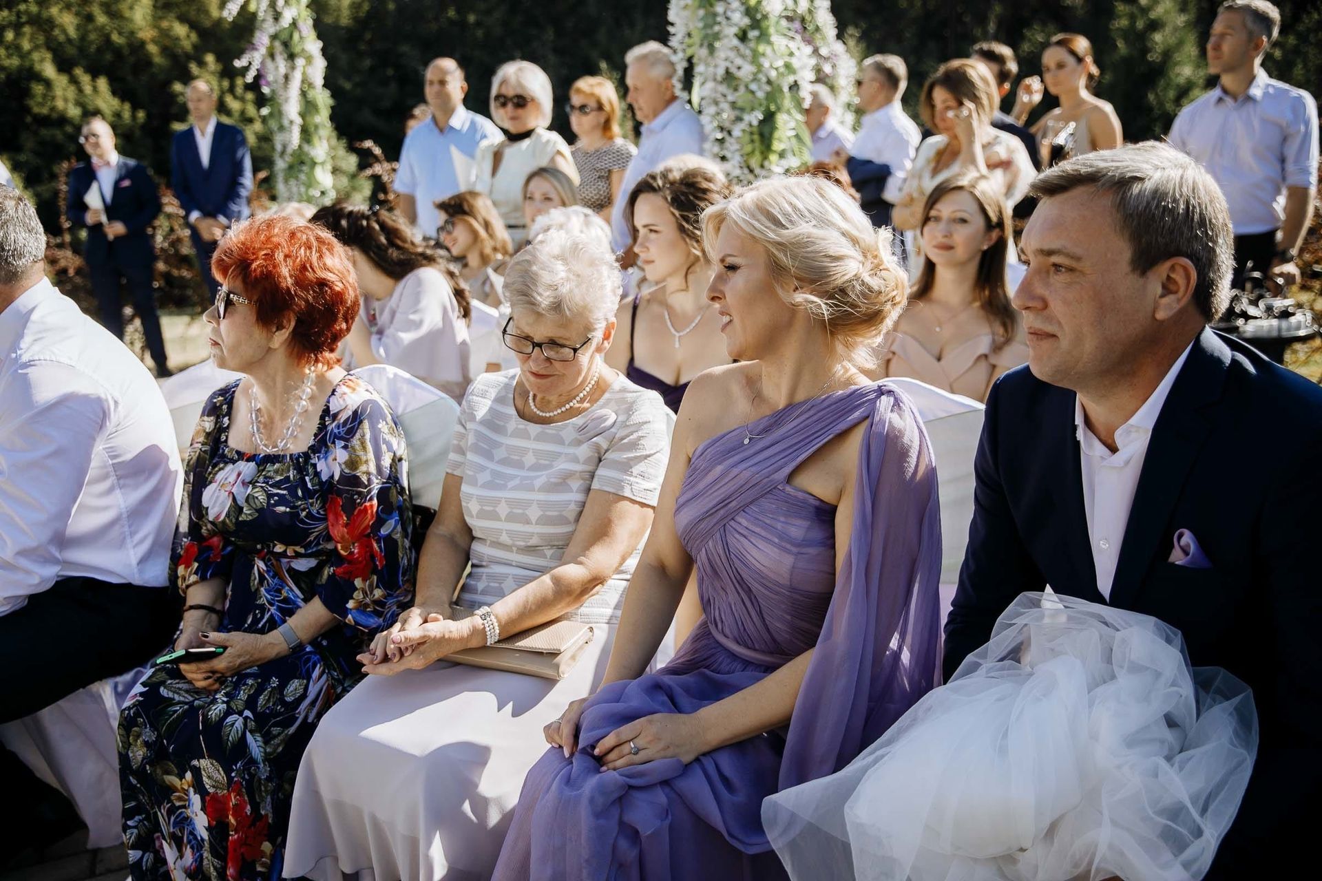 The couple’s parents watching the ceremony, by a wedding photographer, Tanya Bogdan.