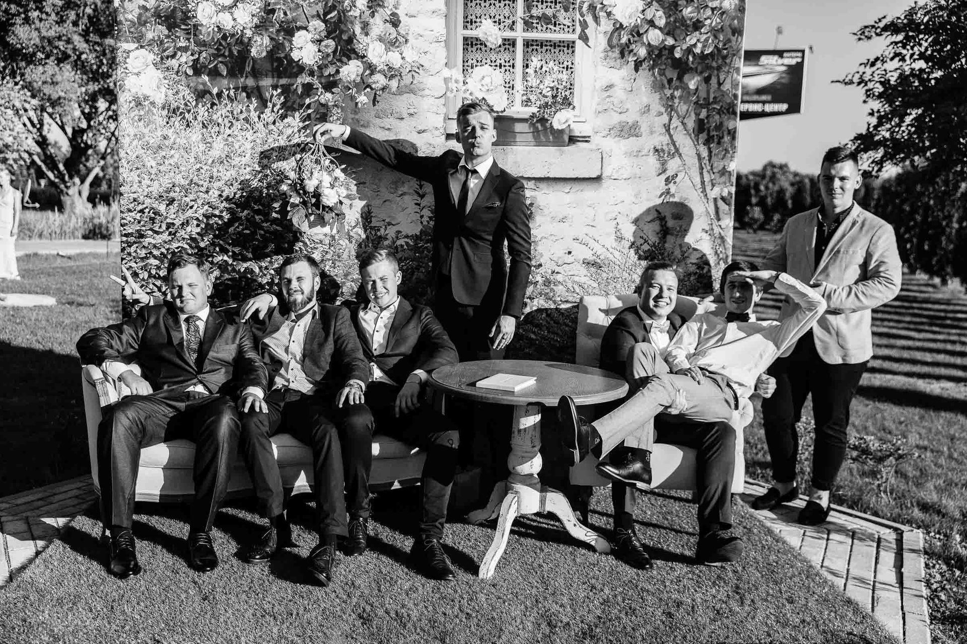A luxury, editorial-style group portrait of the groomsmen, by a London wedding photographer, Tanya Bogdan.