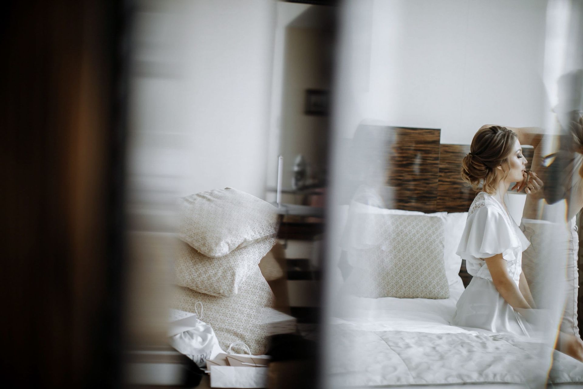 Candid morning prep moment by Bude and Cornwall wedding photographer Tanya Bogdan