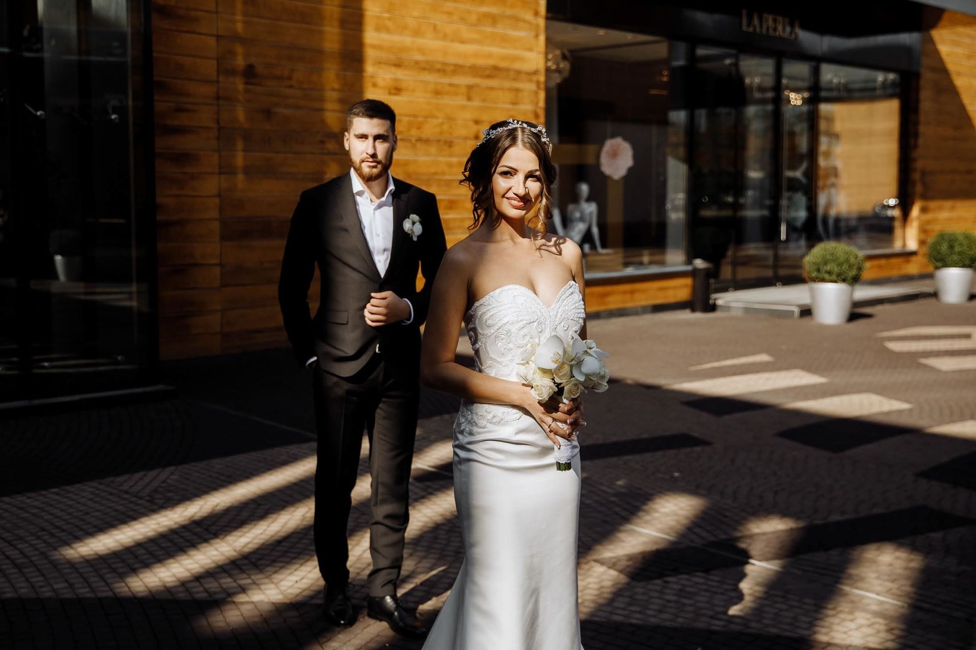 Tanya Bogdan | Candid city portrait of a bride and groom.