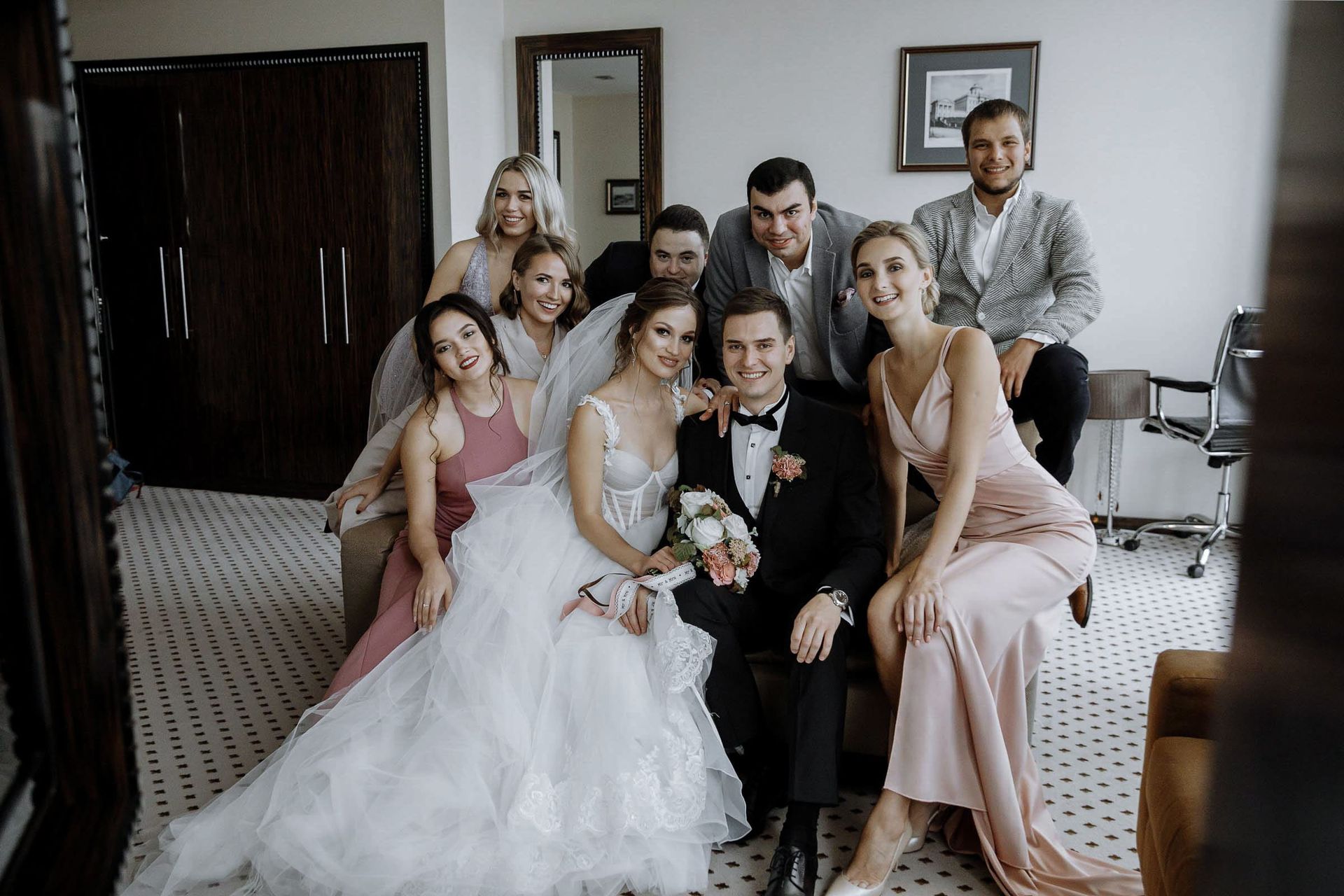 Editorial wedding portrait of groomsmen and bridal party; serving London and the UK.