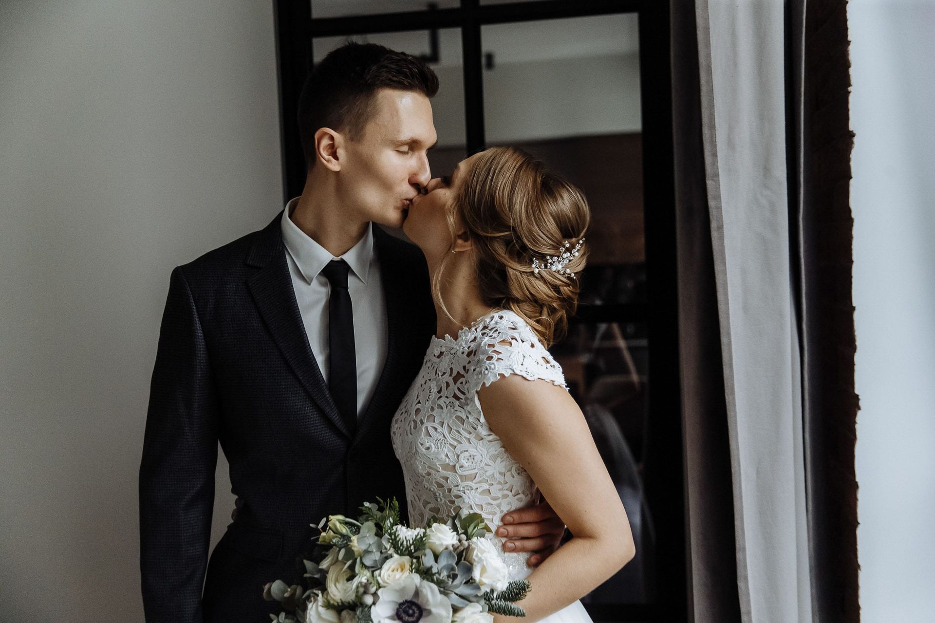 High-end editorial bride and groom kissing photography by Tanya Bogdan.