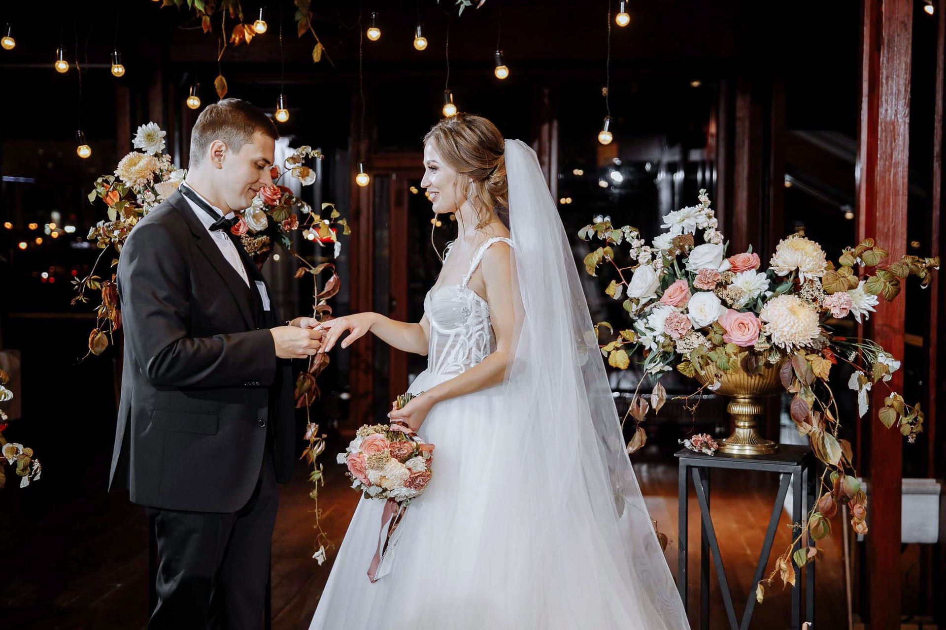 Close-up of exchanging rings during a wedding ceremony.