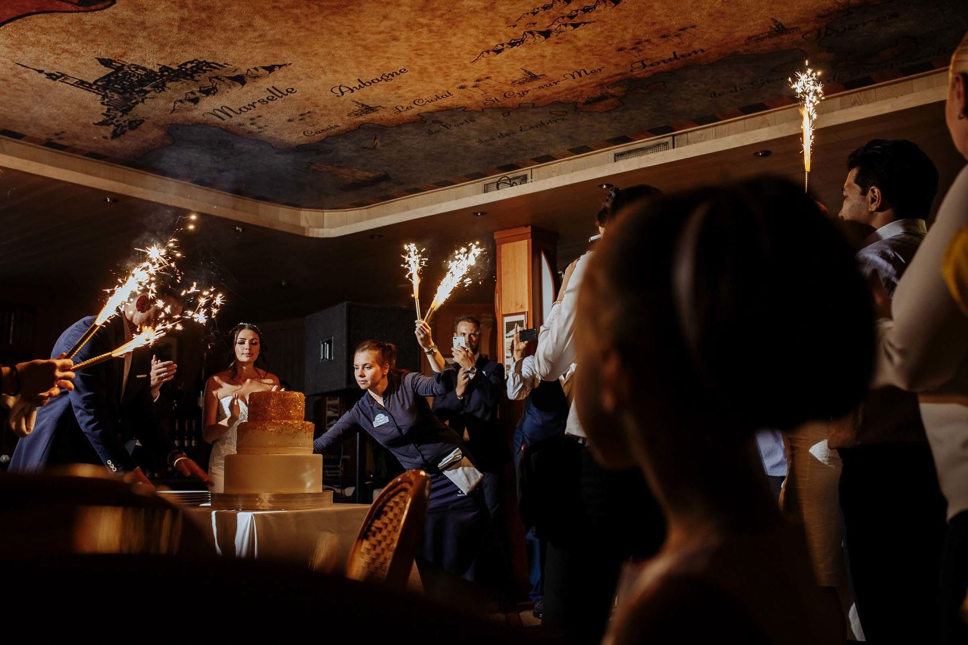 Romantic sparklers with cake by Cornwall wedding photographer Tanya Bogdan.