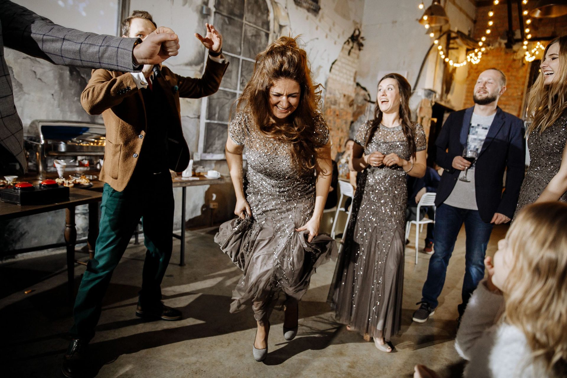 High-energy documentary photography of dancing from London wedding photographer Tanya Bogdan.